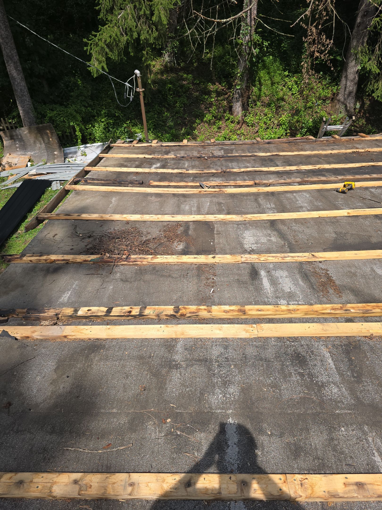 Residential Roofing Installation using Metal by Rainstoppers Roofing