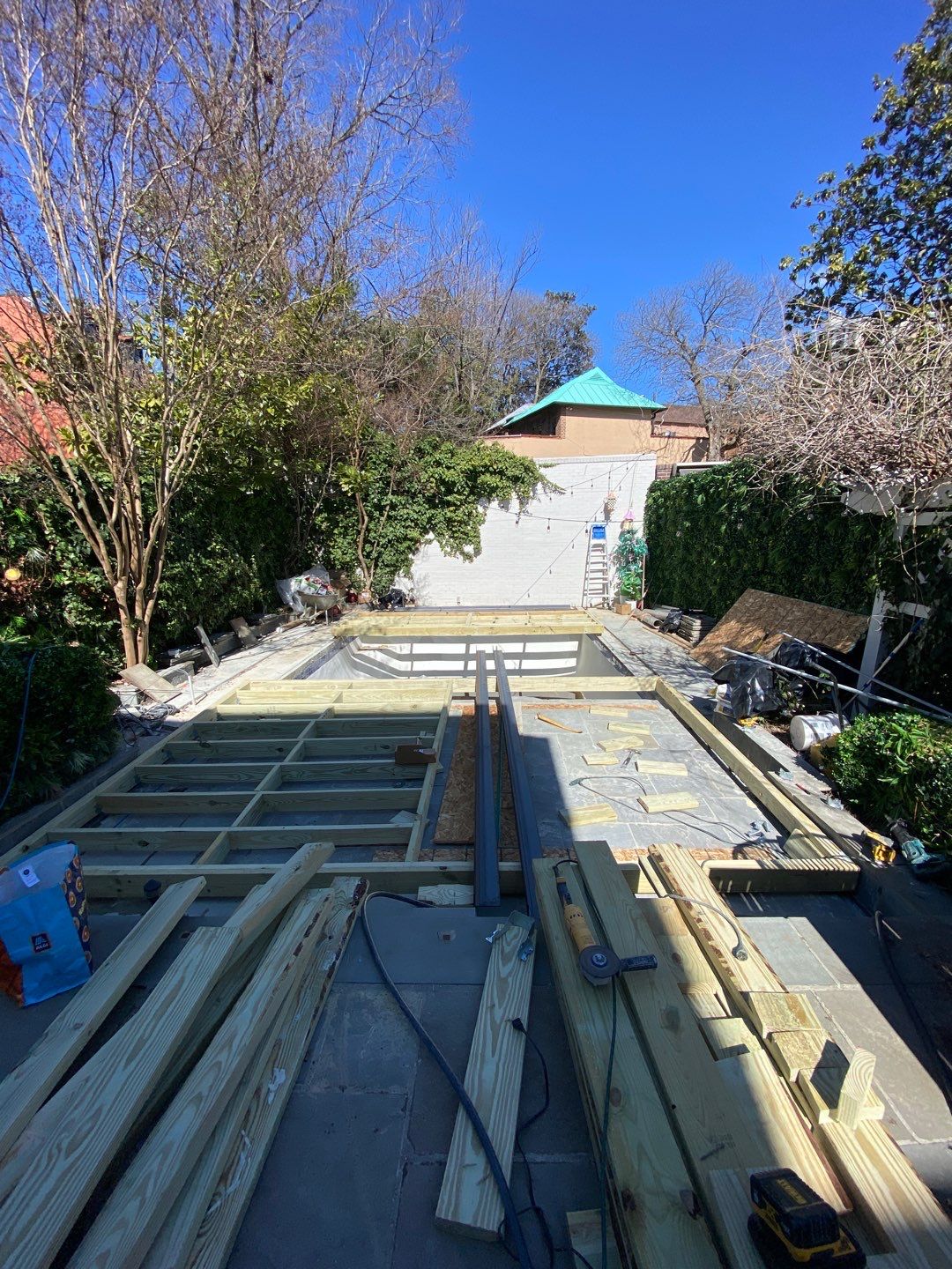Automatic deking pool cover  by Jesus Master Handyman LLC 