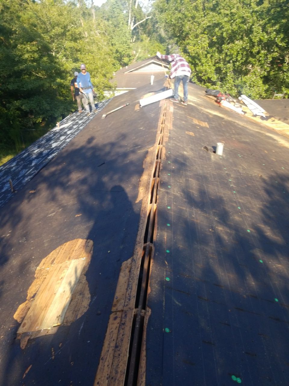 Residential Roofing Installation using Metal roofing by American Roofing & Construction LLC