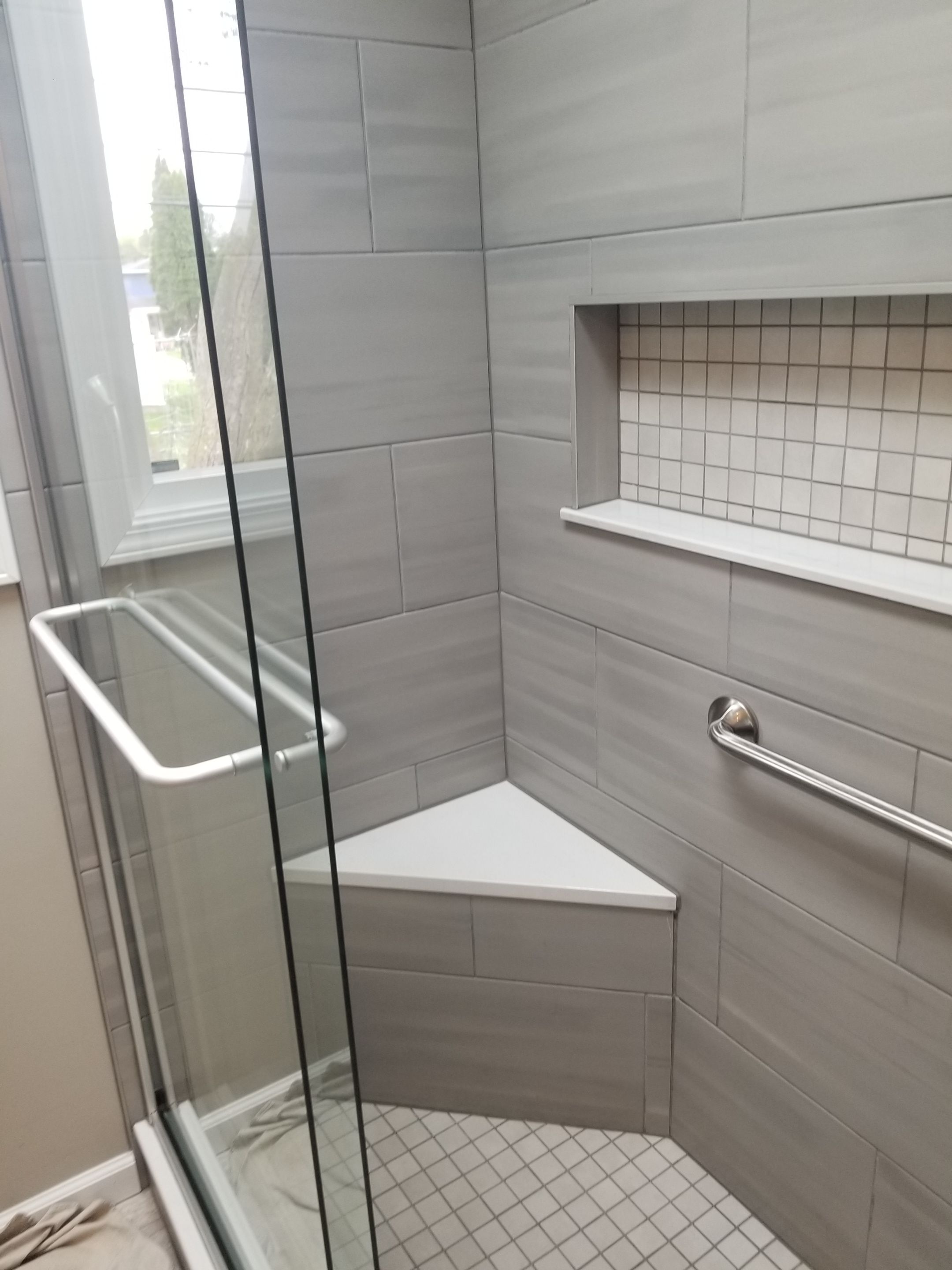 Remodel full bathroom new tile walk in shower plus 2nd half bath Powder room in Livonia, MI by Northwest Construction