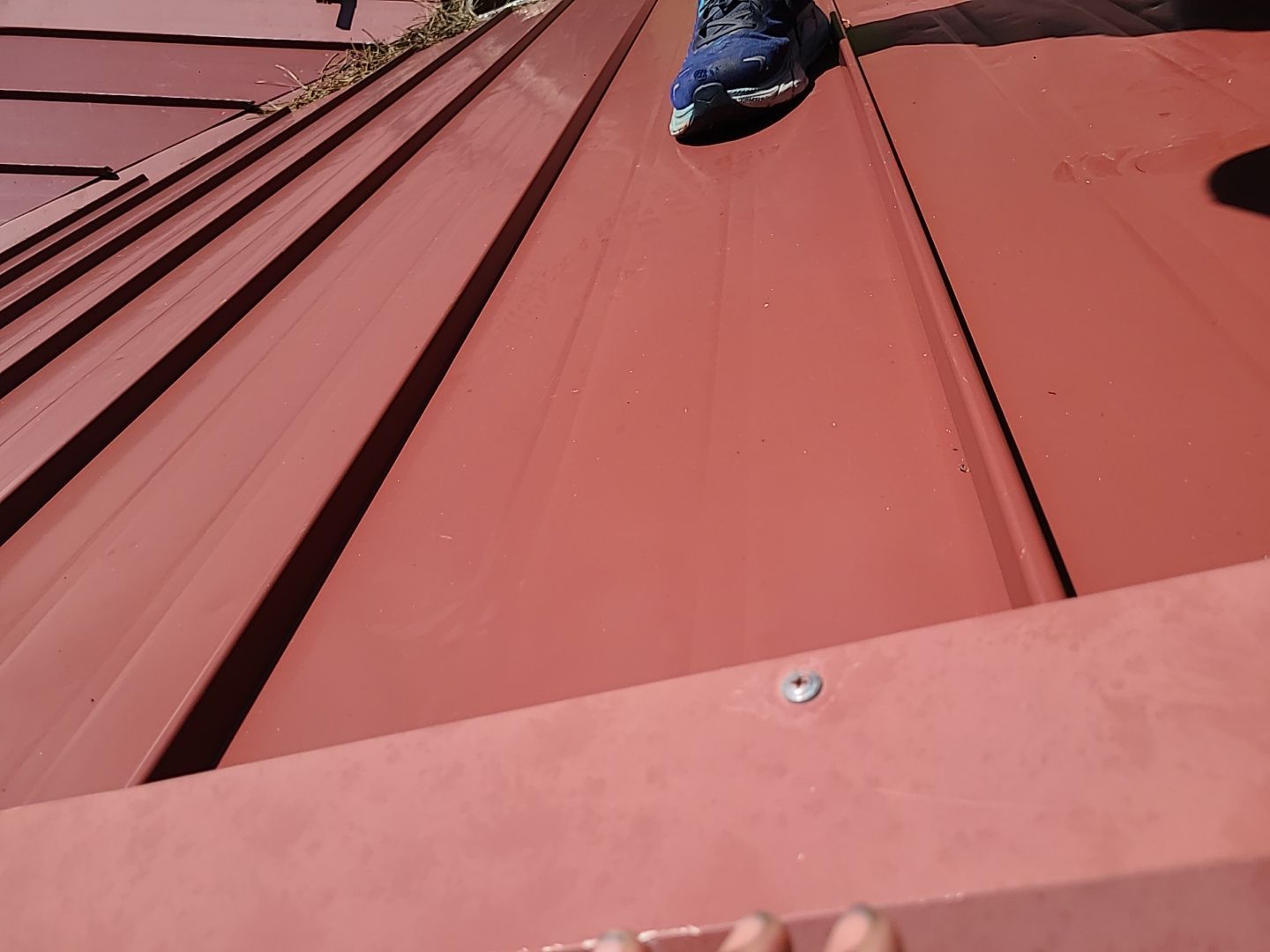 Residential Roofing Installation using Standing Seam Metal by Blue Peaks Roofing LLC 