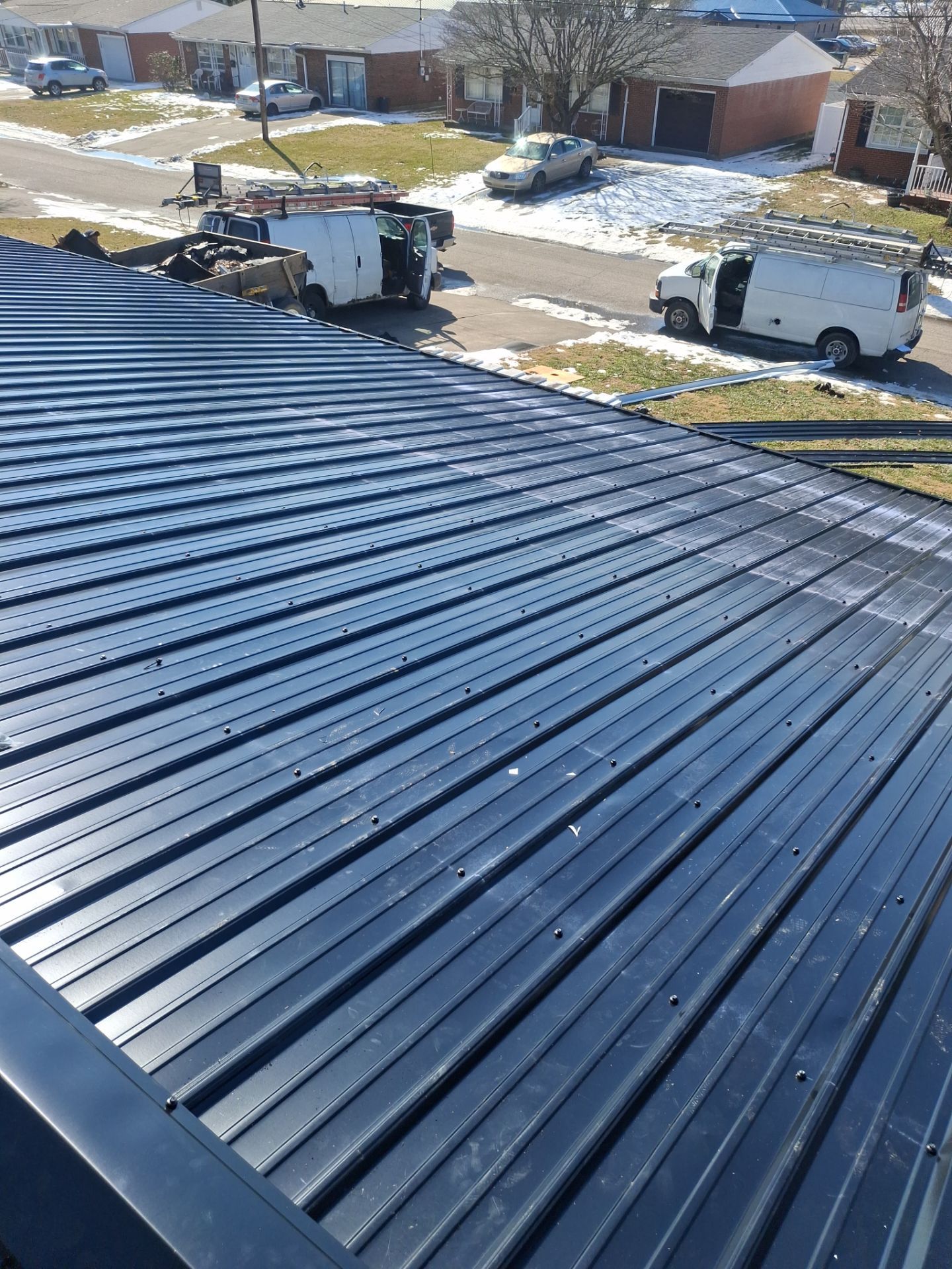 Residential Roofing Installation using Metal by Rainstoppers Roofing