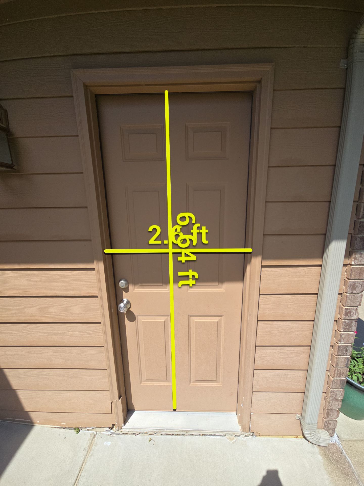 Sioux Falls Residential Exterior Door and Siding Refresh by Select Painting, Coatings & Garage Cabinets