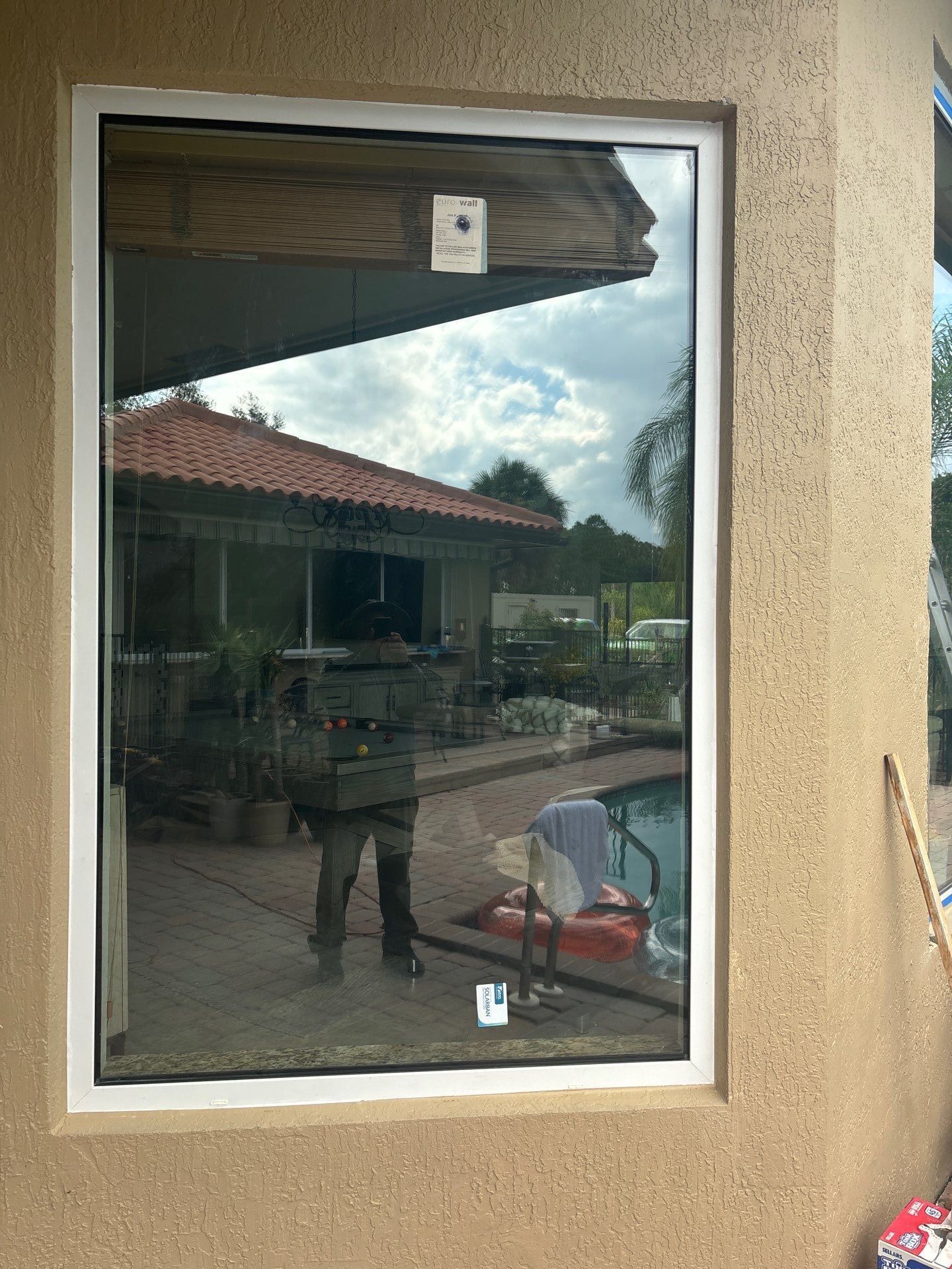 PGT Black pocket doors and Euro-Wall storefront & SGD by Windows For Life 