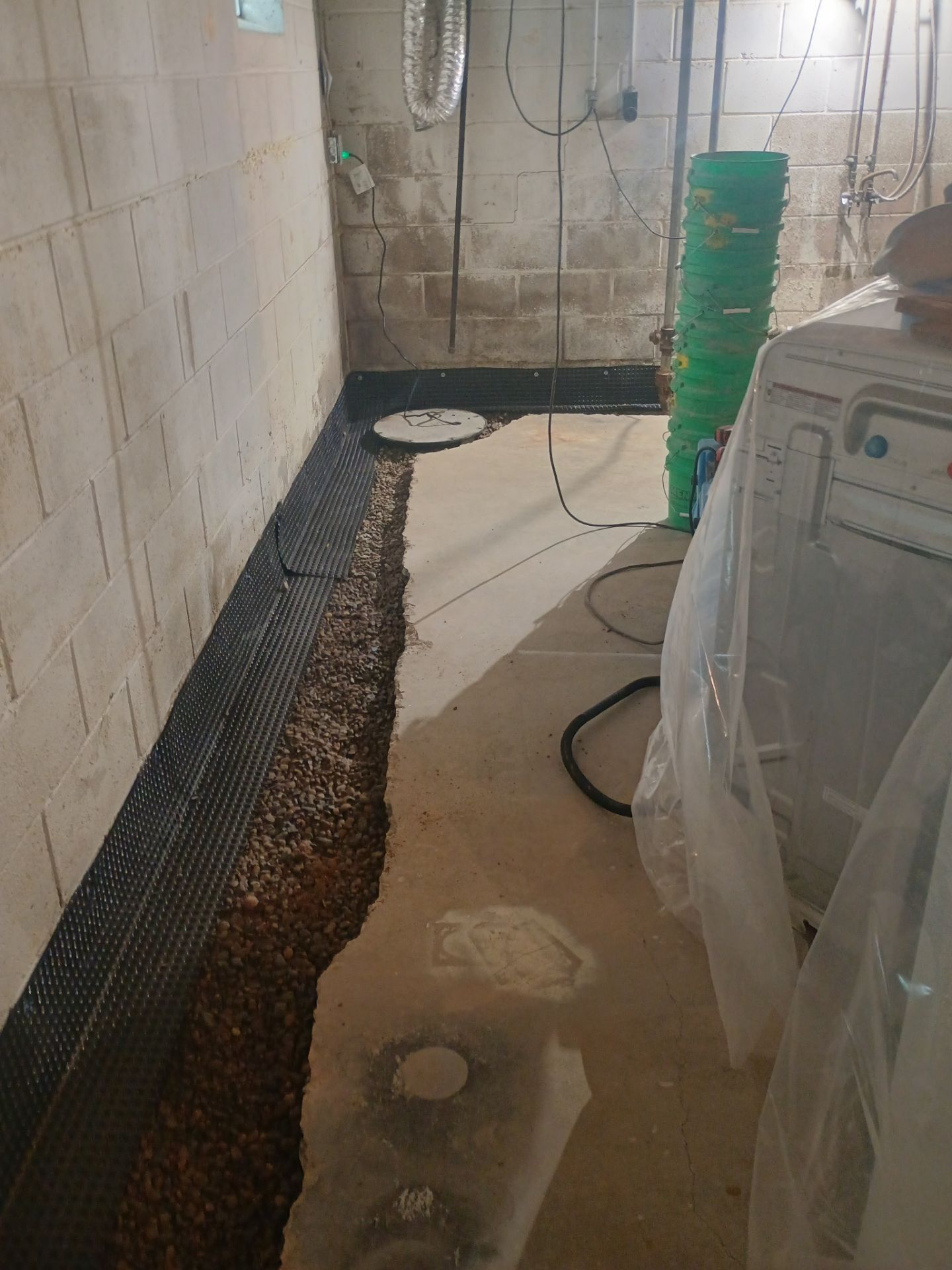 Interior Drain Tile Installation near Columbia Heights, MN by Waterproofing Northeast