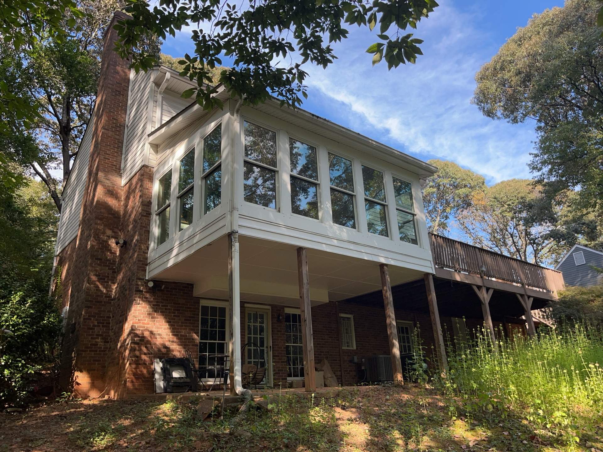 Deck Build and Screened-In Porch Install with Wild Hog 6' Black Mesh Panel Railing by Nelson Exteriors