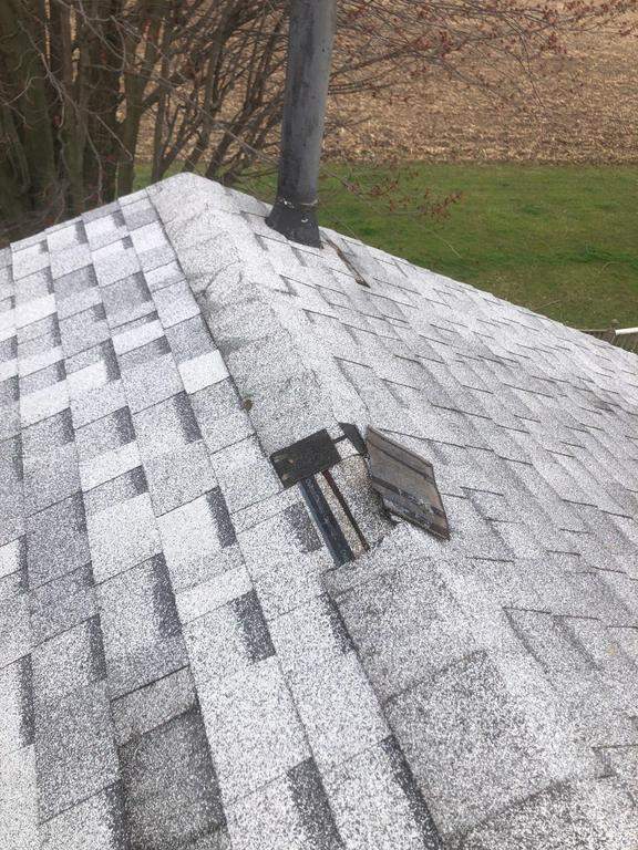 Storm damage roof replacement by Nitro Roofing and Construction