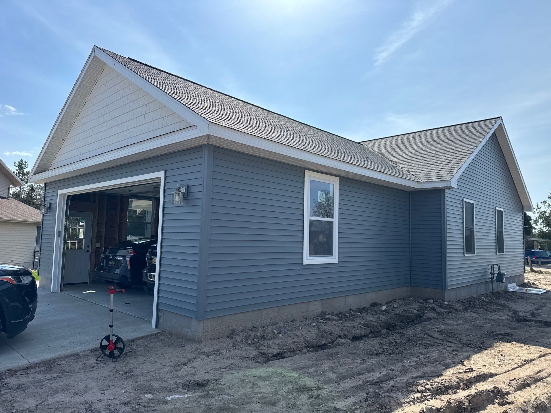 Gutter System Installation for New Home Construction in Petoskey by Rainbow Seamless Systems