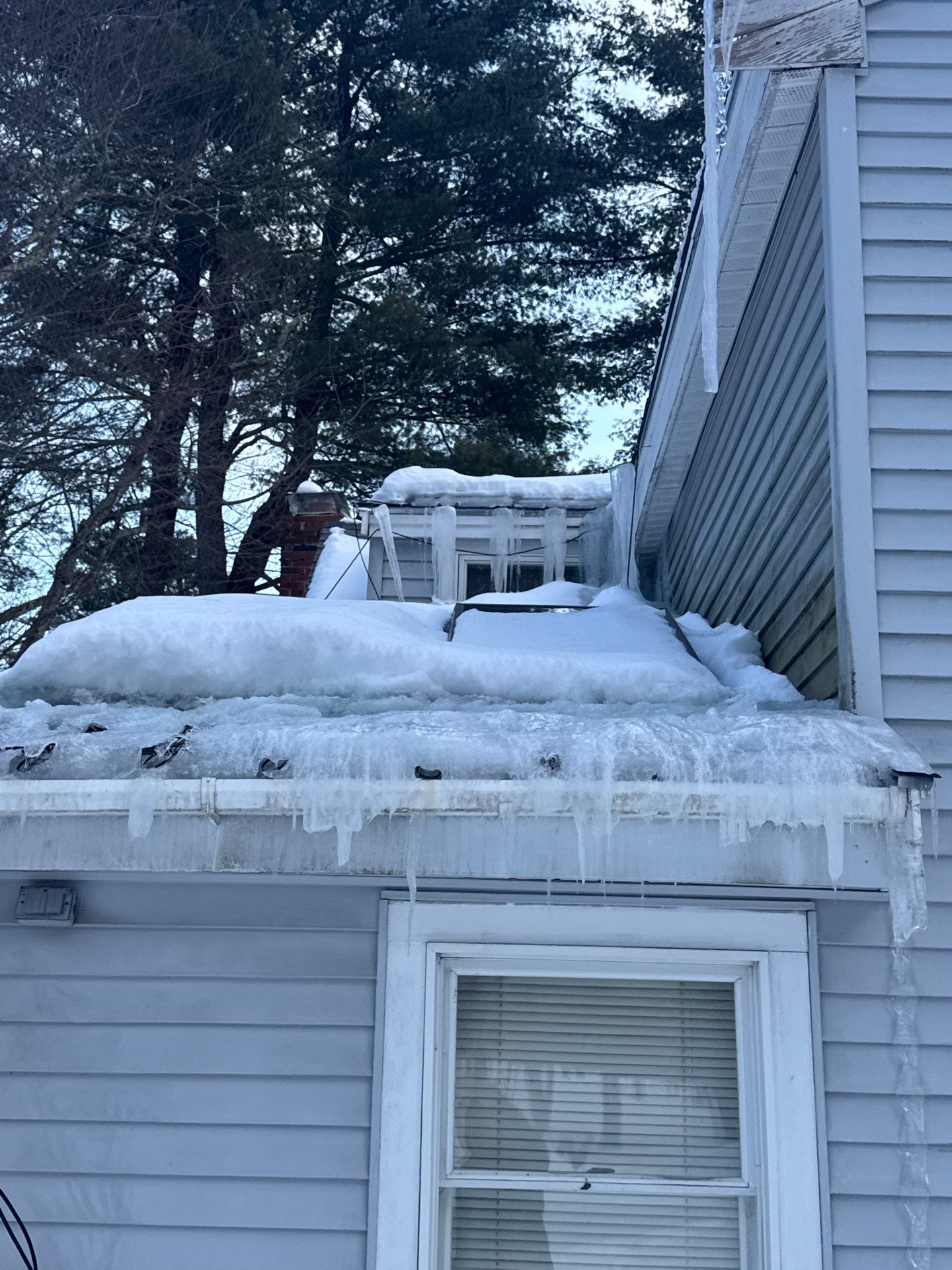 Ice Dam Removal, Snow Removal & Sidewall Flashing Repair in Acton, MA by Mighty Dog Roofing of Greater Middlesex County