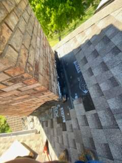 Cricket and Flashing Repair  by Rhino Roofing and General Contracting, LLC