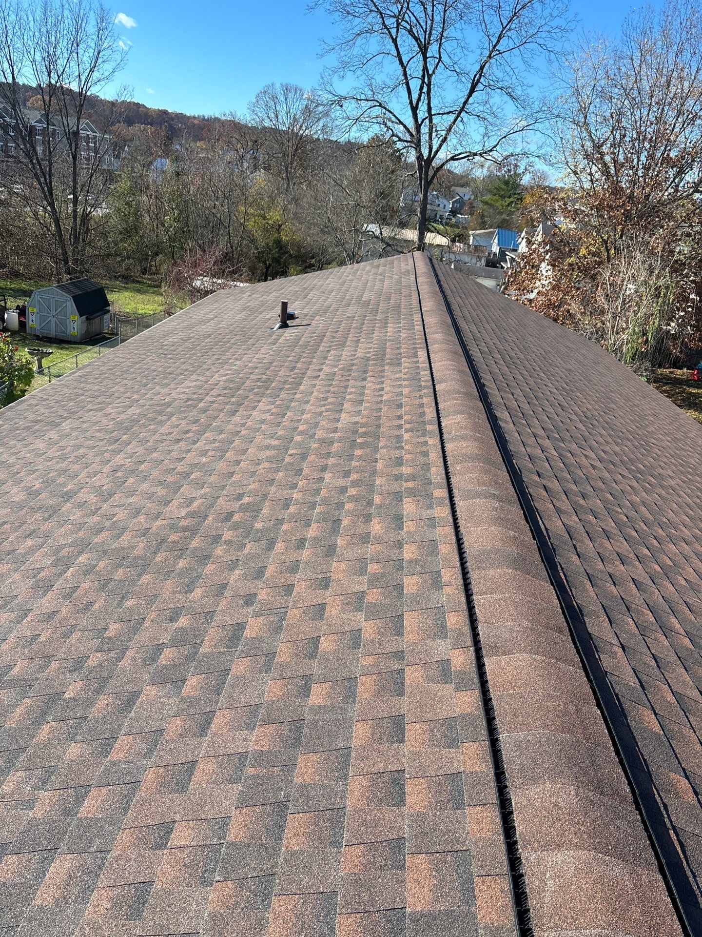 Residential Roofing Installation using GAF TImberline HDZ Hickory by Rainstoppers Roofing