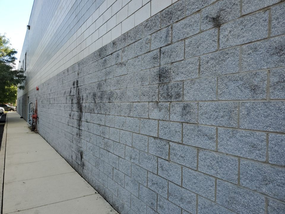 commercial pressure washing using Algaecide, soft wash soap by Northern Power Washing LLC.