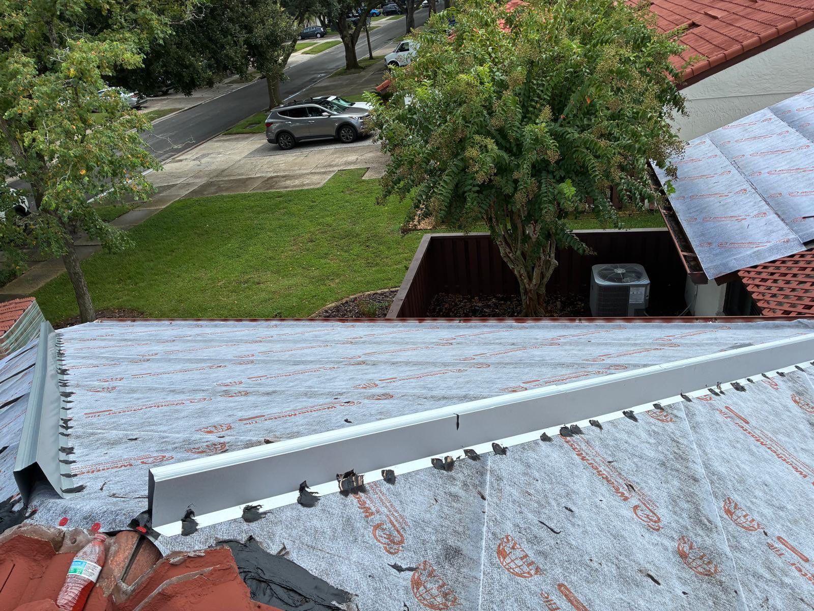 Residential Tile Roof Replacement and Gutter Installation in Winter Park by Pinnacle Roofing Group