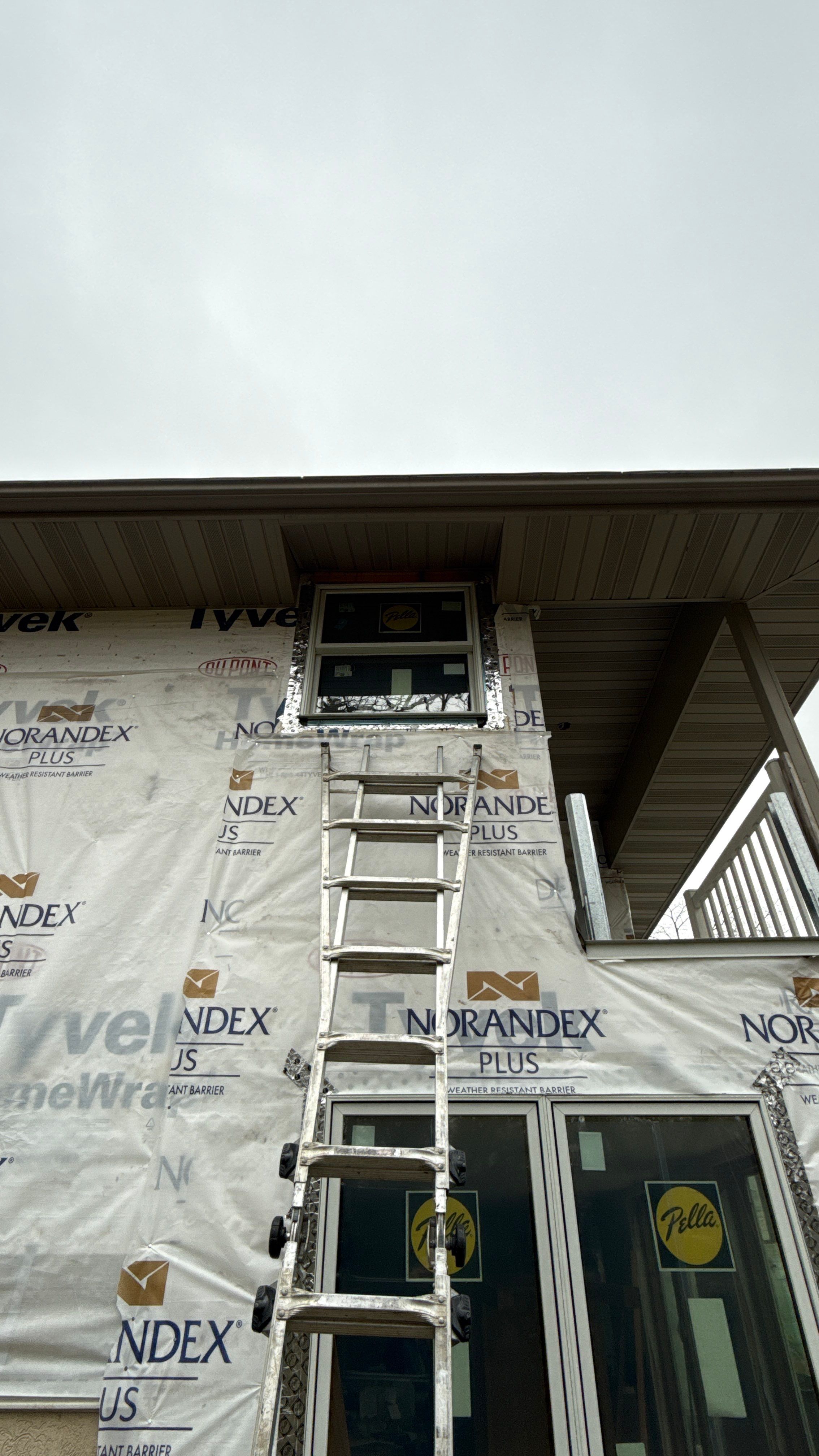 A Clean Window Upgrade Ready for New Siding with Pella Lifestyle Series by United Windows and Siding LLC