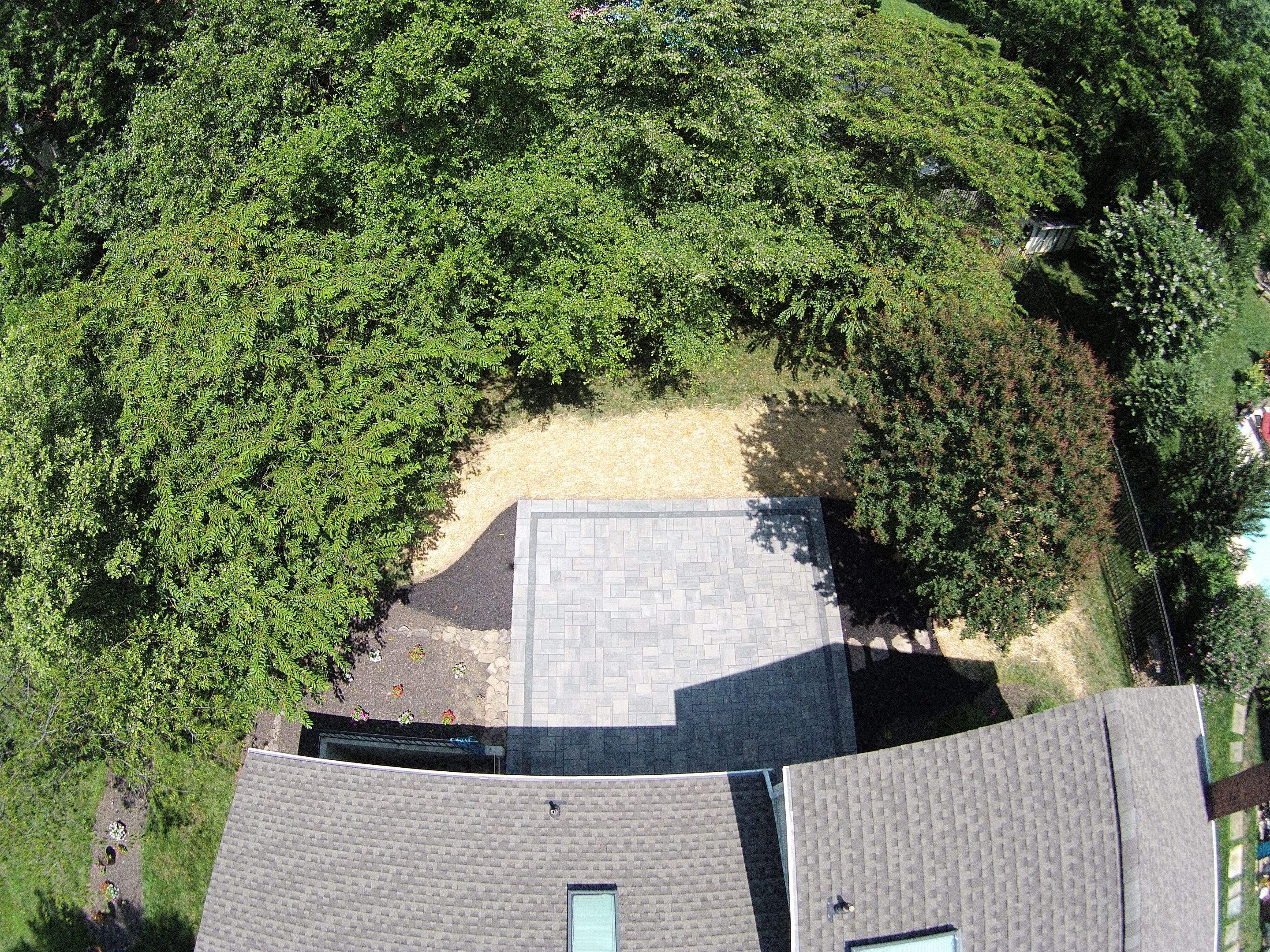Backyard Transformation using Techo-Bloc Pavers by The Smet Companies, LLC