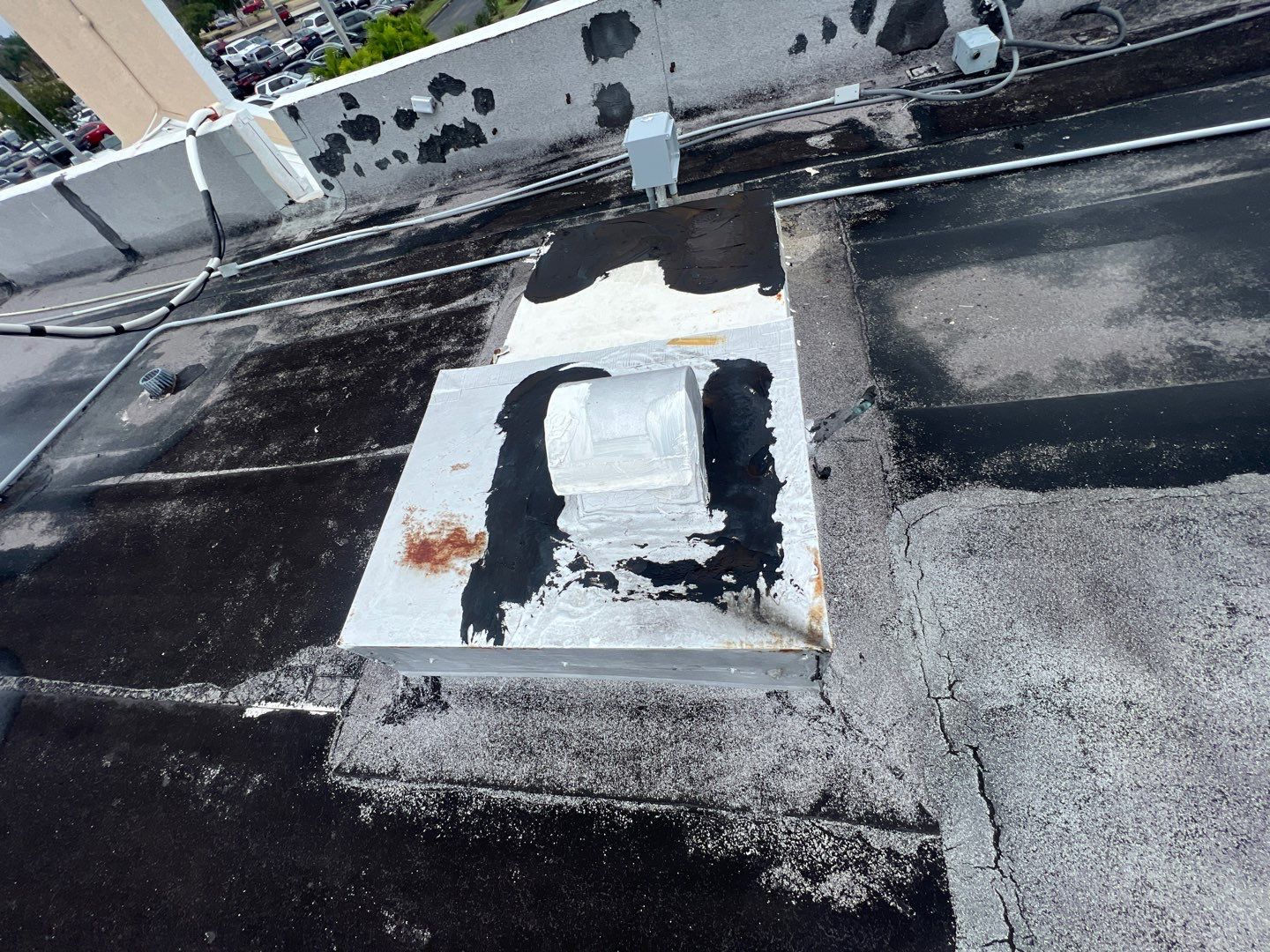 Commercial Roofing Repair using Roof Sealant by Four Peaks Roofing