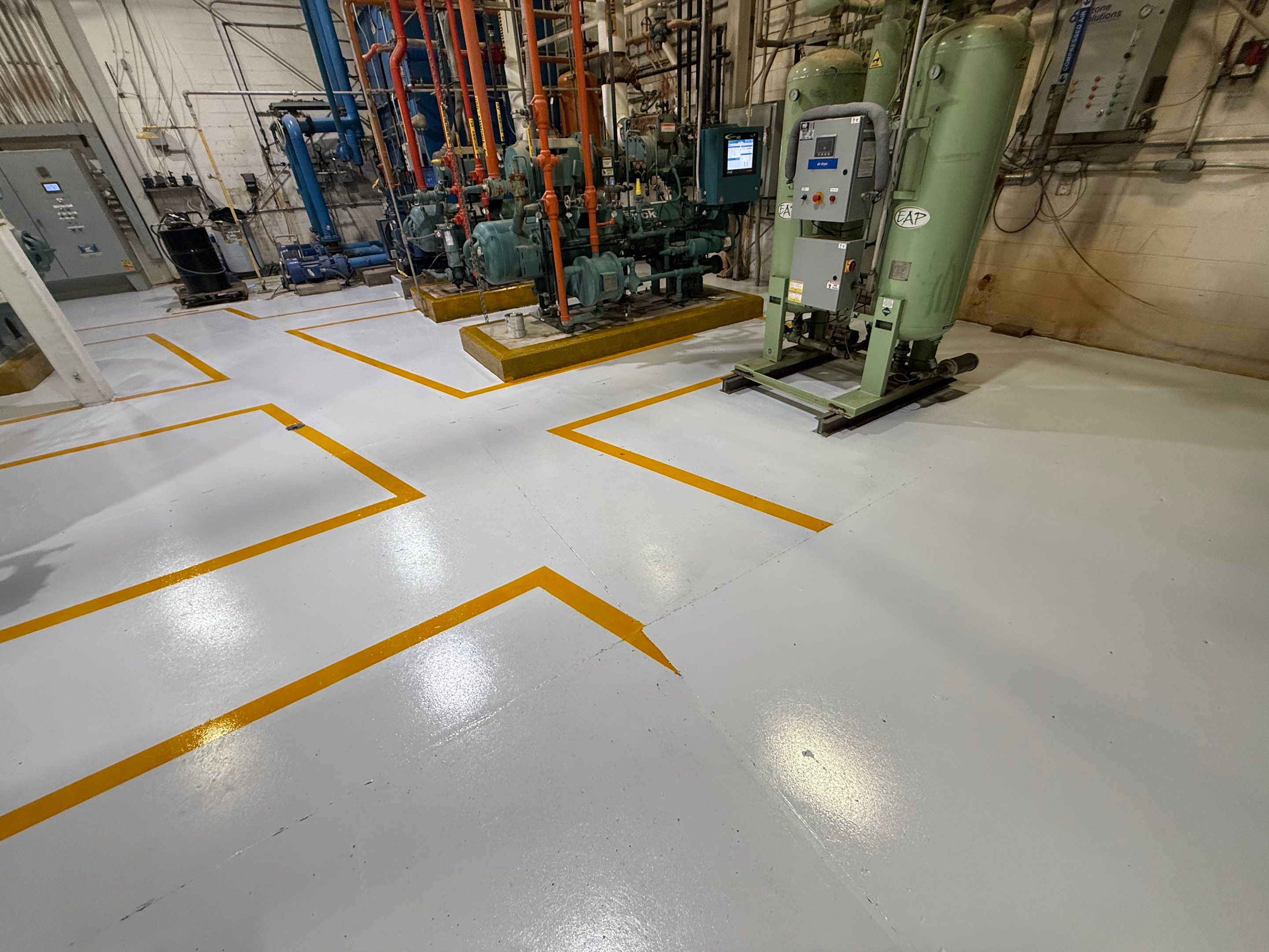 Industrial Epoxy Floor Coating for Perdue Premium Meat Co in Sioux Center by Select Painting, Coatings & Garage Cabinets