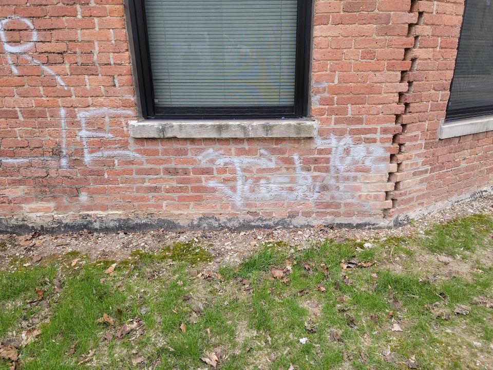 Graffiti removal  using Graffiti remover by Northern Power Washing LLC.