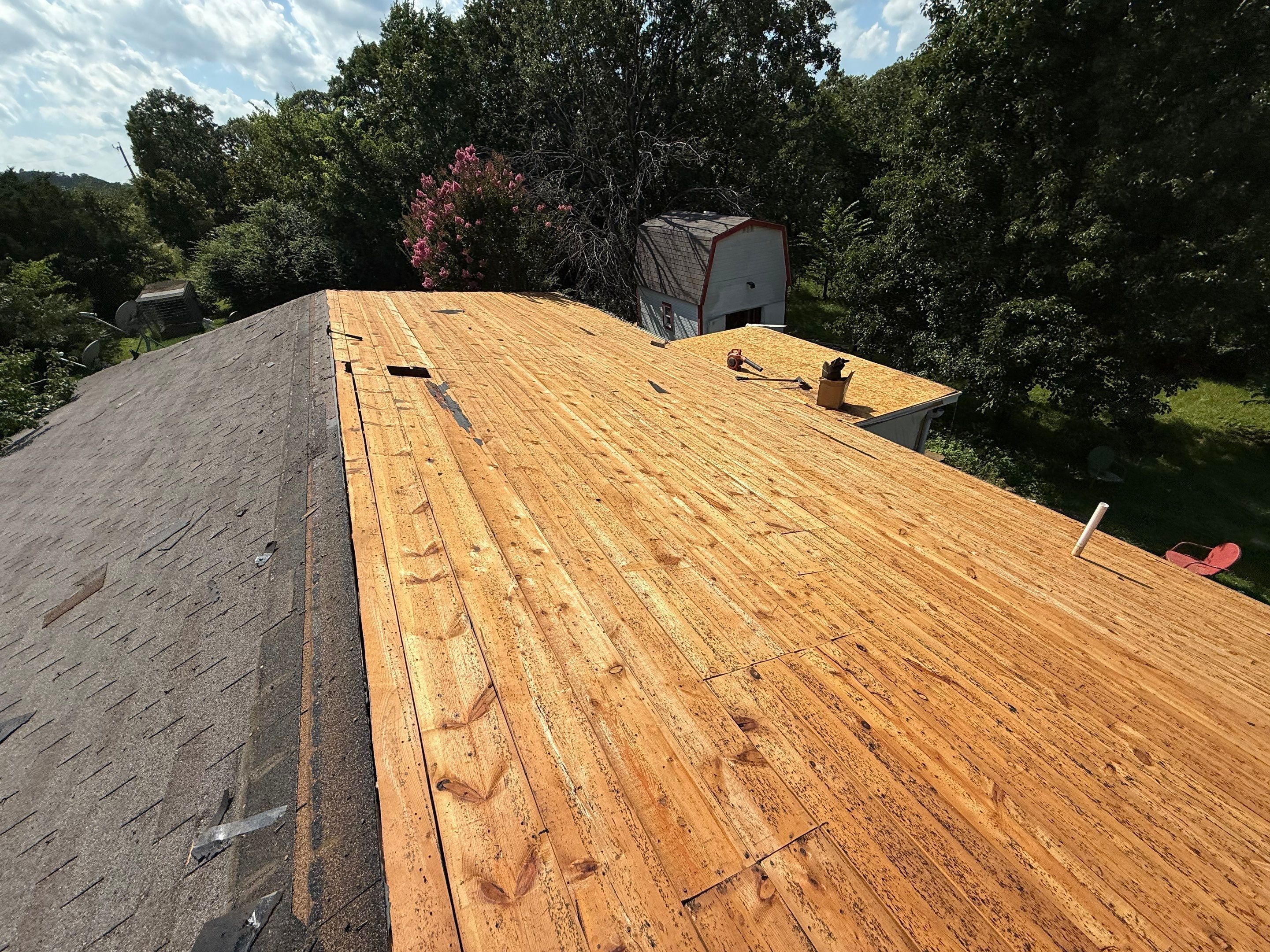 2 layers tear off & installation of new architectural shingles. by In & Out Construction & Remodeling, LLC