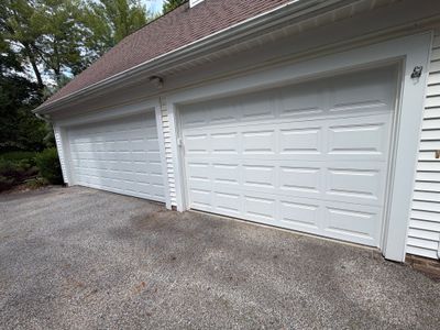 White Raised Panel Sectional Garage Door Installation in Solon