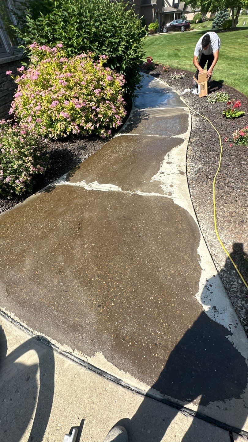 Driveway + Garage + Walkway Project in Meridian by Floors in a Day, Inc