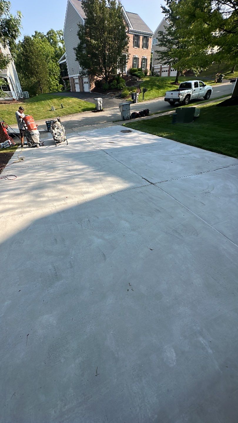 Pool Deck + Driveway + Garage Project in Venetia by Floors in a Day, Inc
