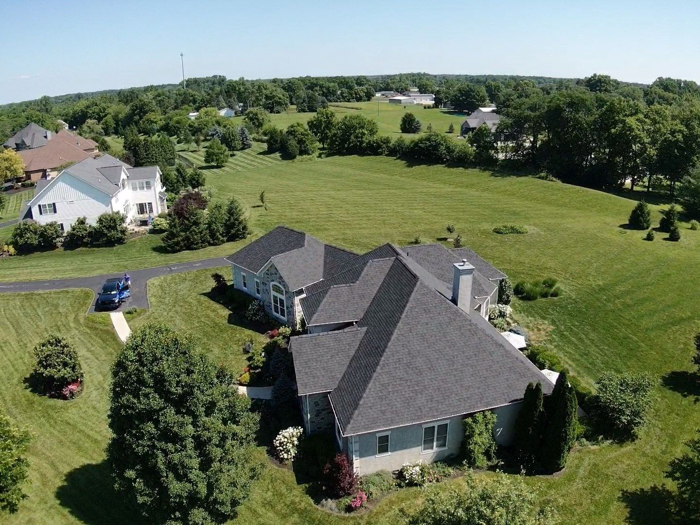 Residential Roofing Installation using Atlas Pinnacle Black Shingles by 614 Exteriors