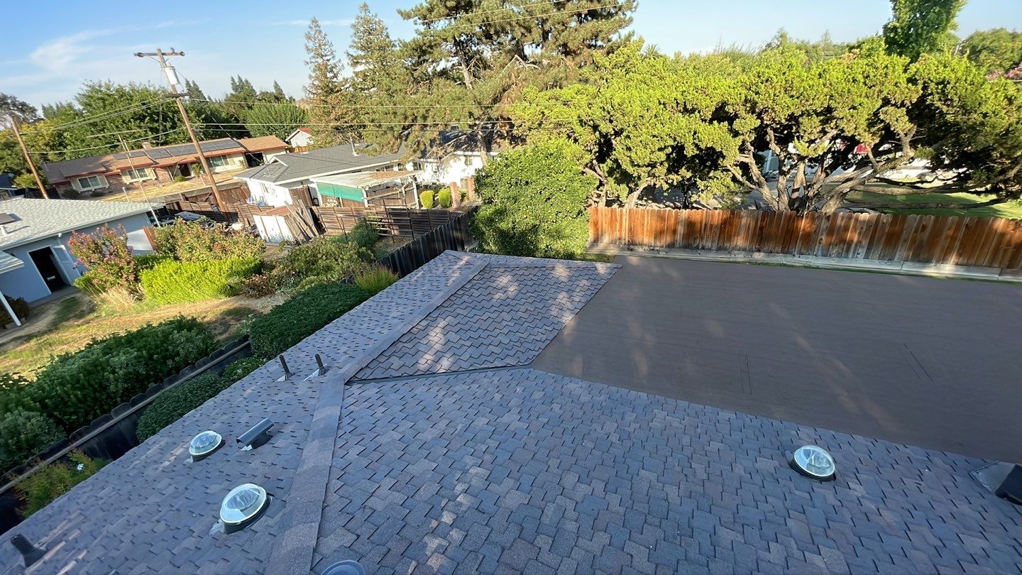 Installation of Certainteed Presidential shingles on residential house by Straight Edge Roofing Inc