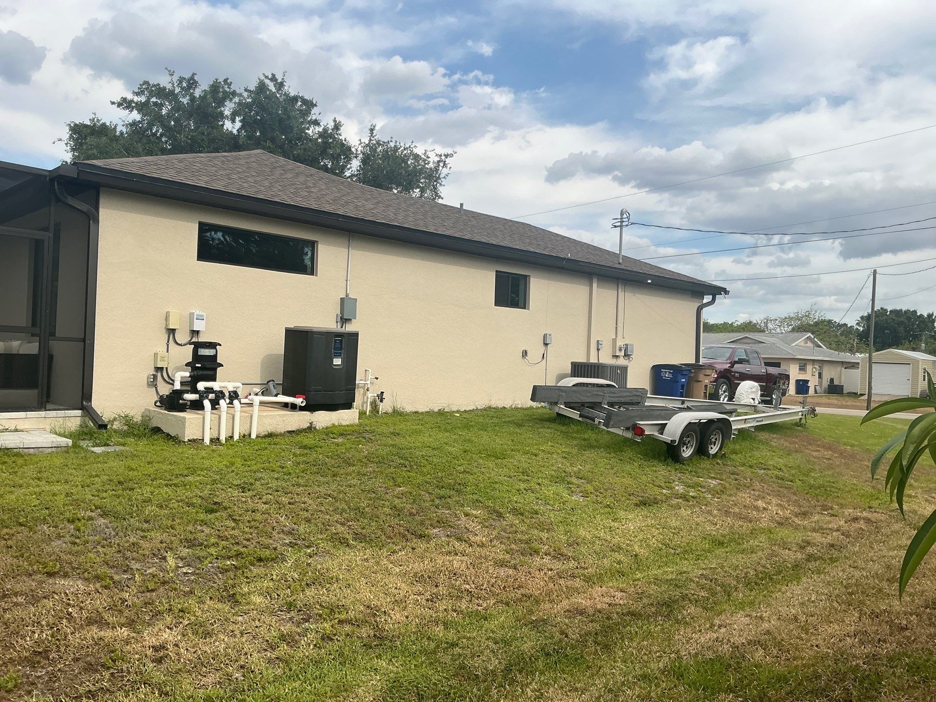 Custom Seamless Gutters and Downspouts for Large Homes in Tampa FL by Gutter Professor by Gutter Professors