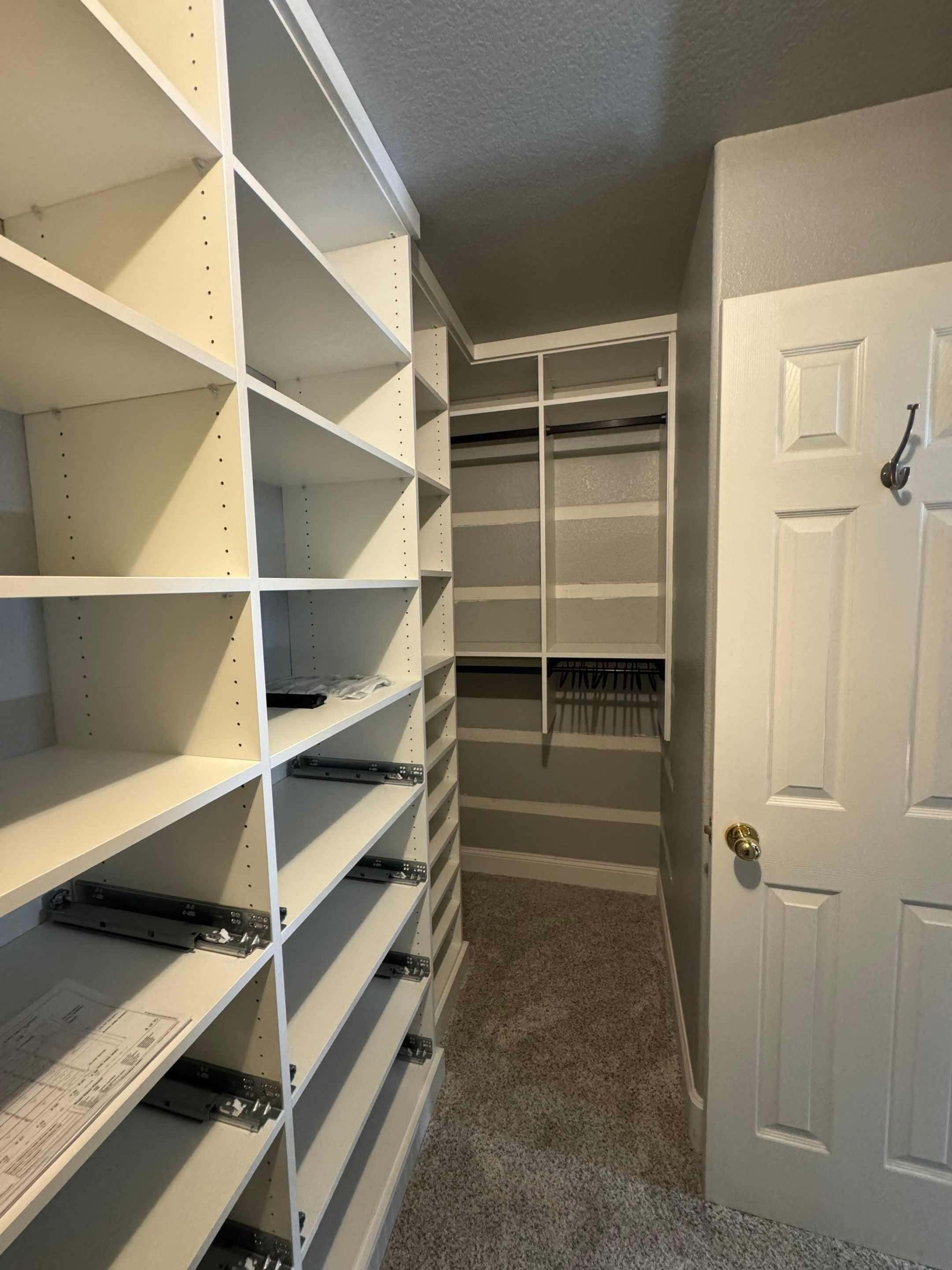 Custom Built-In and Primary Closet in Longmont by Concept 32, Inc.