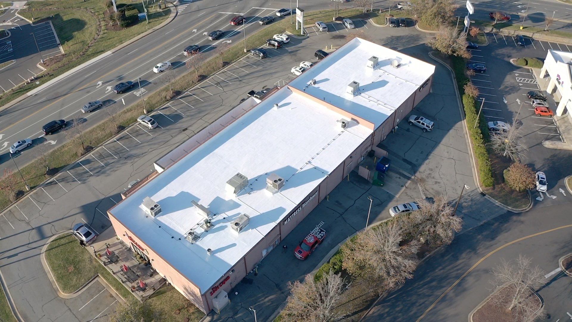 Commercial Coating using Poly Urerthane and Silicone Coating by Just In Time Roofing and Restoration