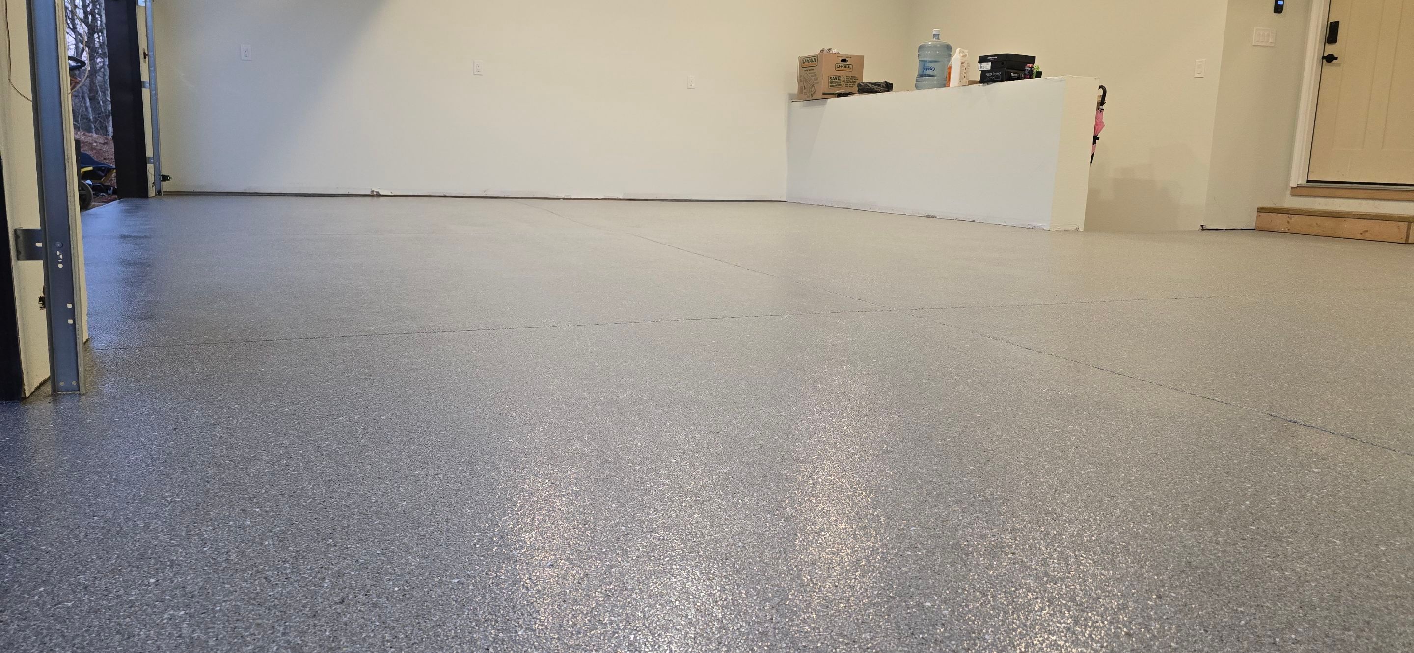 Garage using Travertine by Elite Floor Solutions