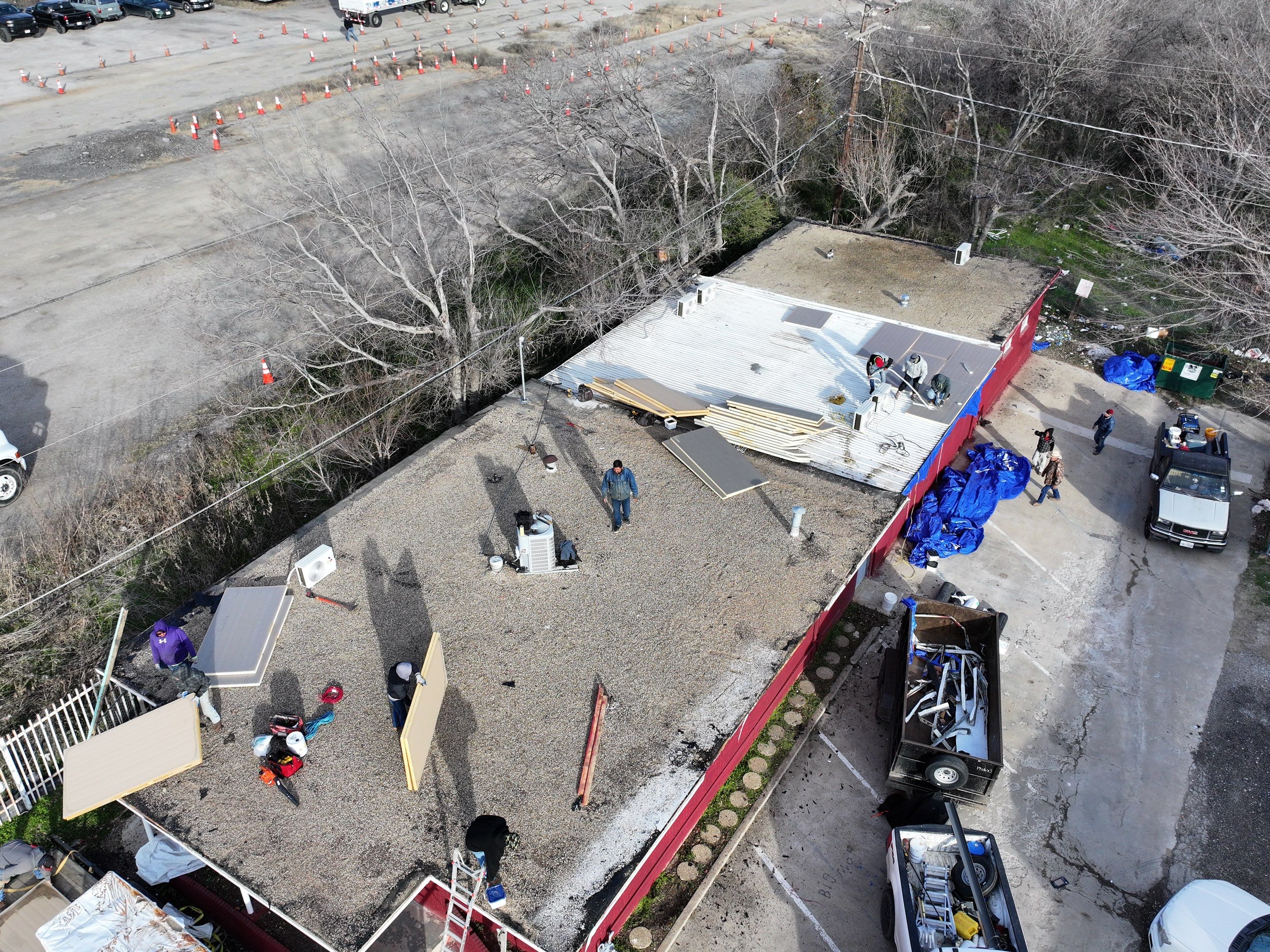 Commercial roofing overlay using GAF TPO over an old ballast roof by Becker Roofing and Exteriors