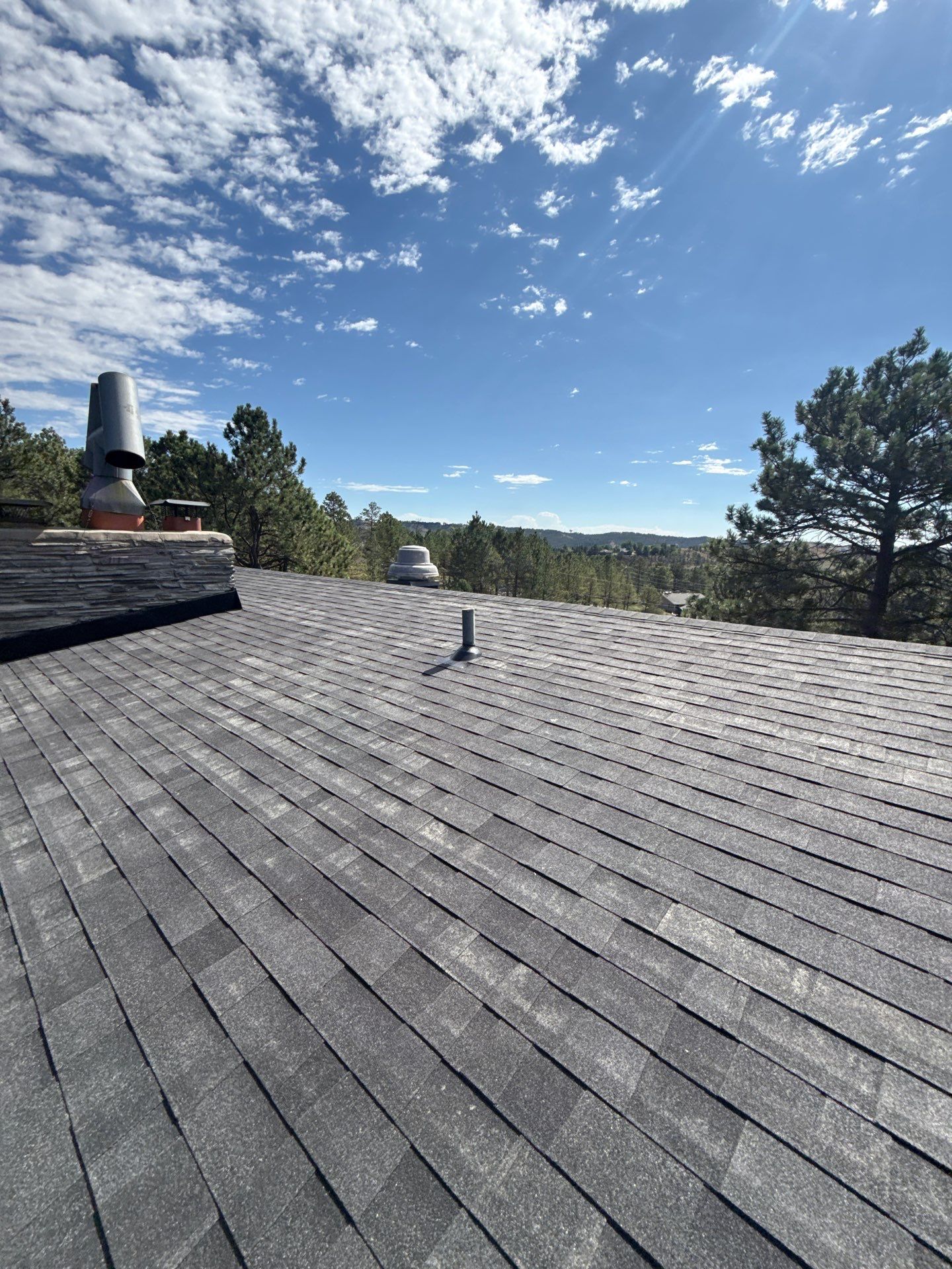 Full Architectural Shingle Installation for Contemporary Rapid City Residence by Weather-Tite Exteriors LLC