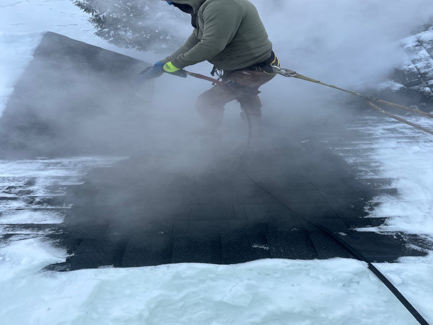 Roof Snow And Ice Dam Removal using Steamer by Total Restoration Services