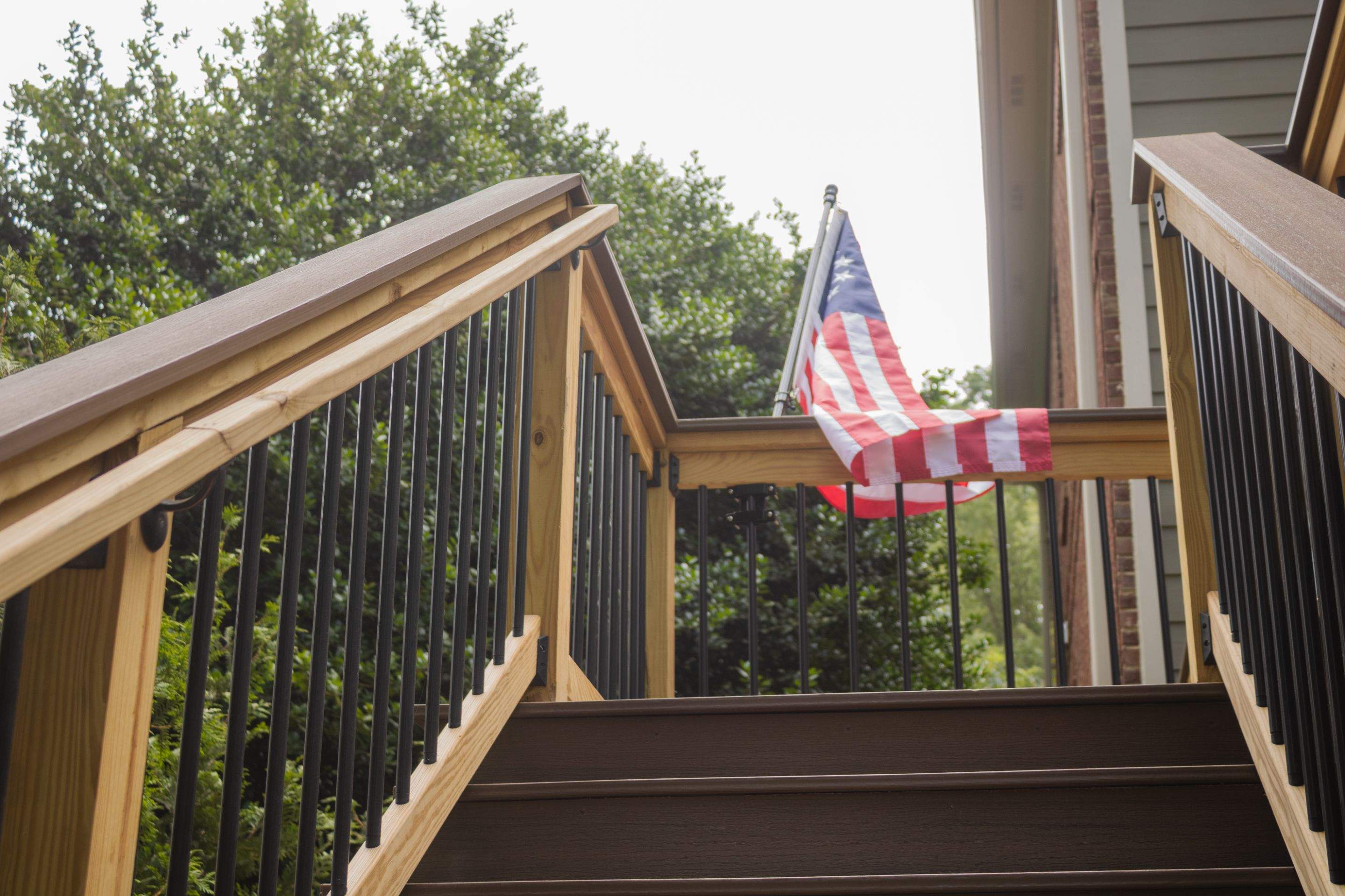 Tucker, GA Covered Porch Build and Deck Replacement using Deckorators Voyage Series Decking by Nelson Exteriors 