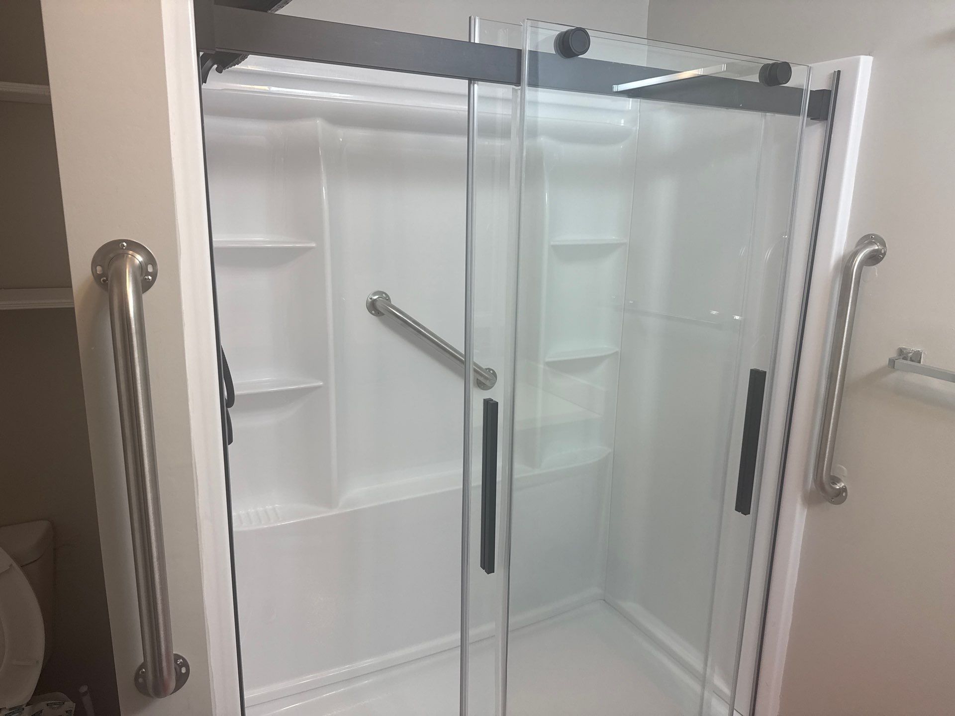 Shower Replacement with Sliding Glass Doors in Oak Island, NC by RGR Construction and Roofing, LLC