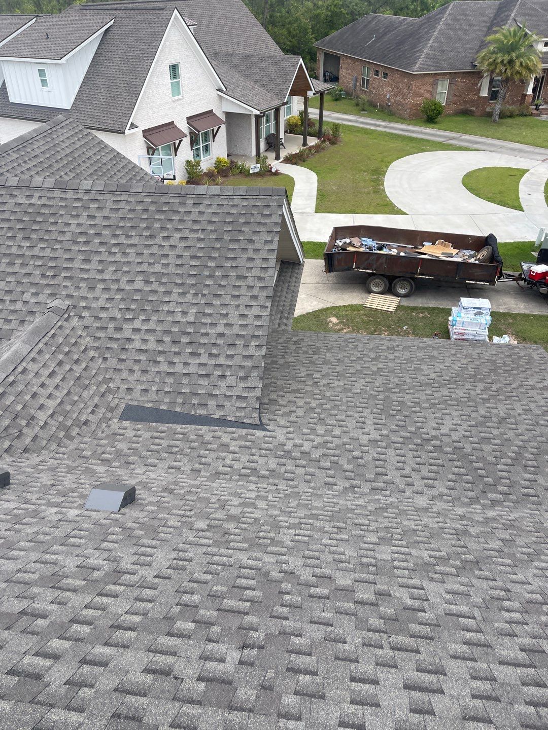 Residential Roofing Installation using Roof Replacement by American Roofing & Construction LLC