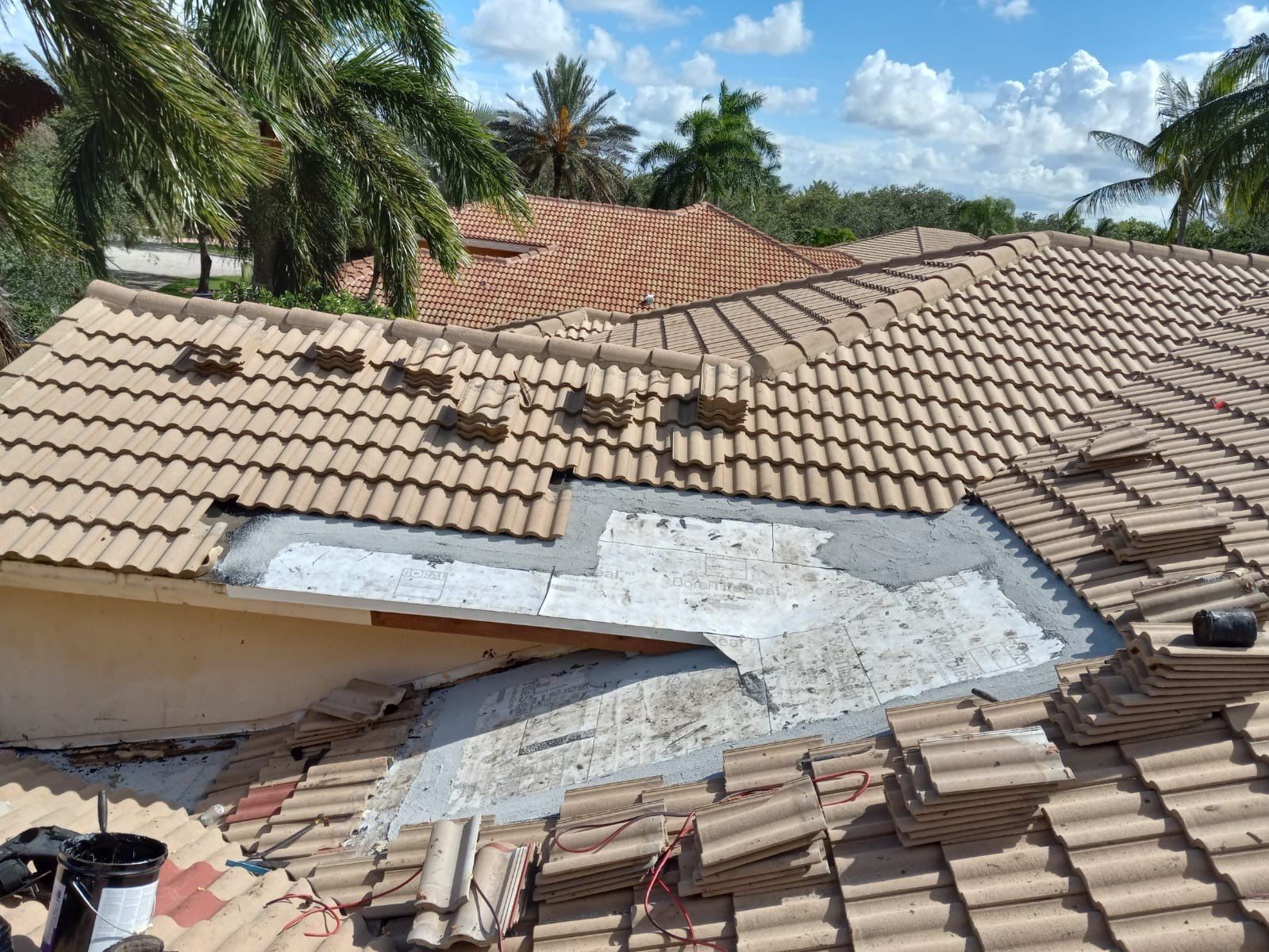 Concrete Tile Roof Leak Repair and Wood Decking Replacement in Parkland by Aastro Roofing