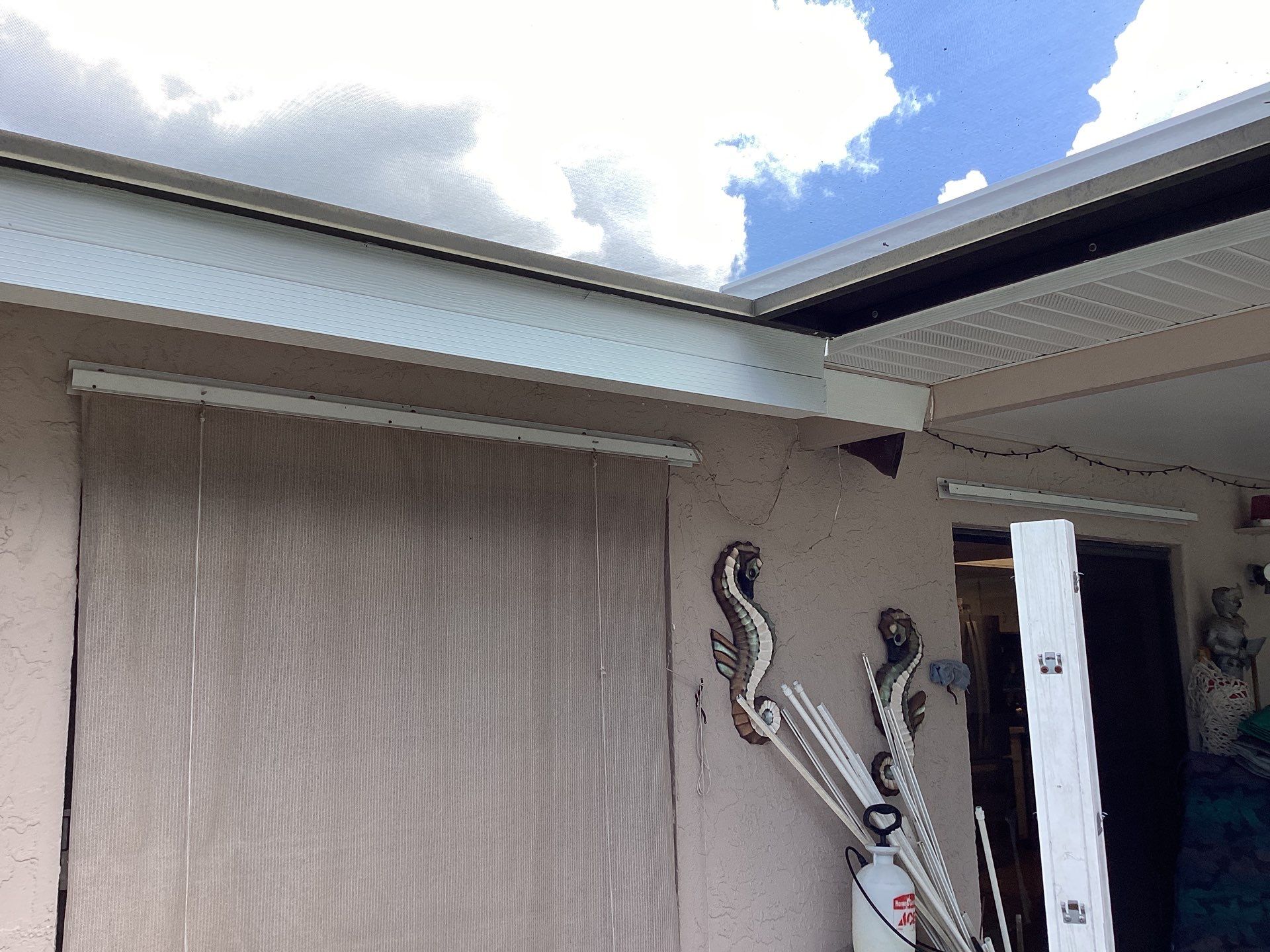 White Seamless Gutters and Splash Guards in Fort Myers FL by Gutter Professor by Gutter Professors