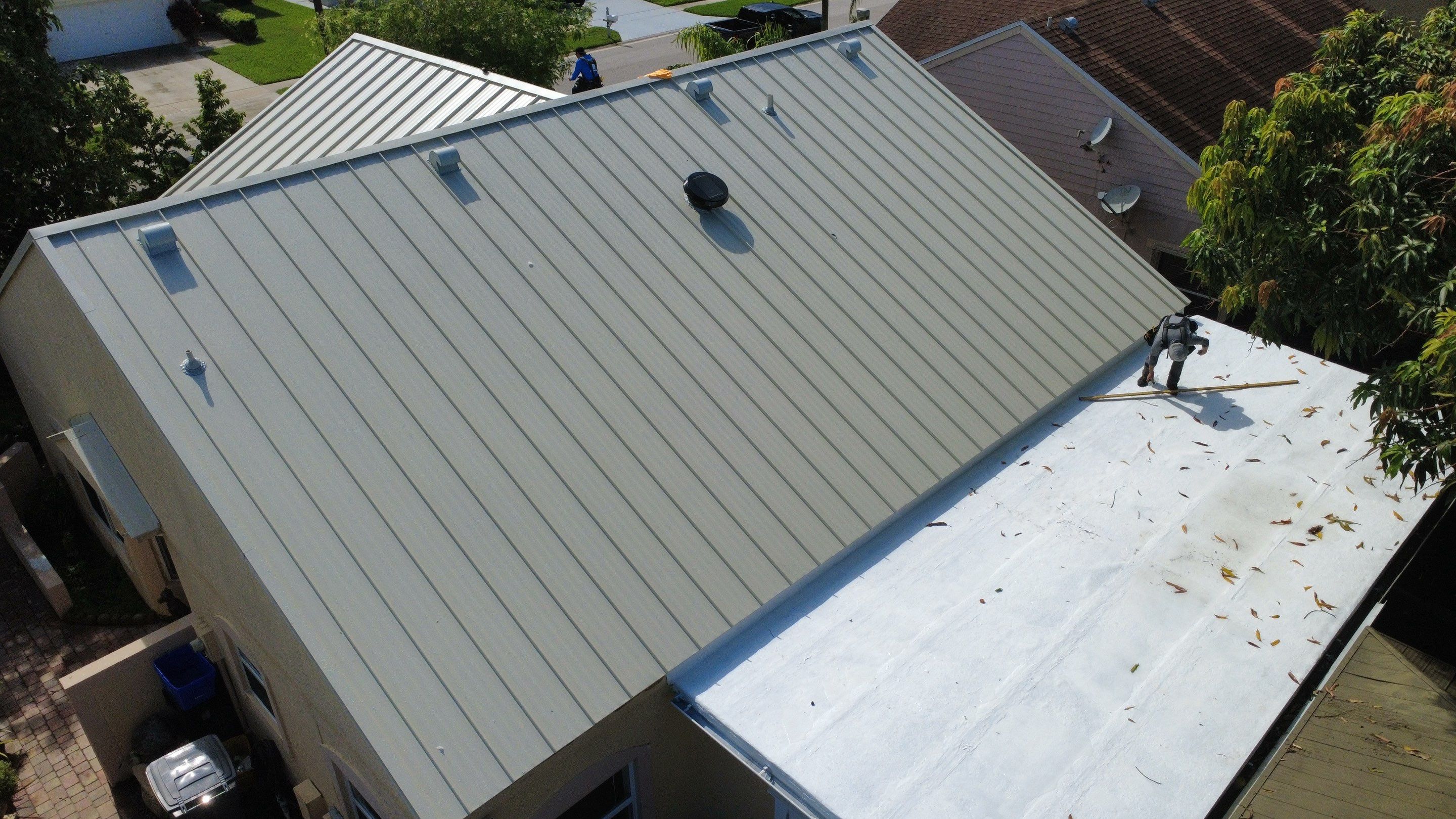 Residential Roofing Installation using 1.5'' Mechanical Seam by BLUES BROTHERS ROOFING