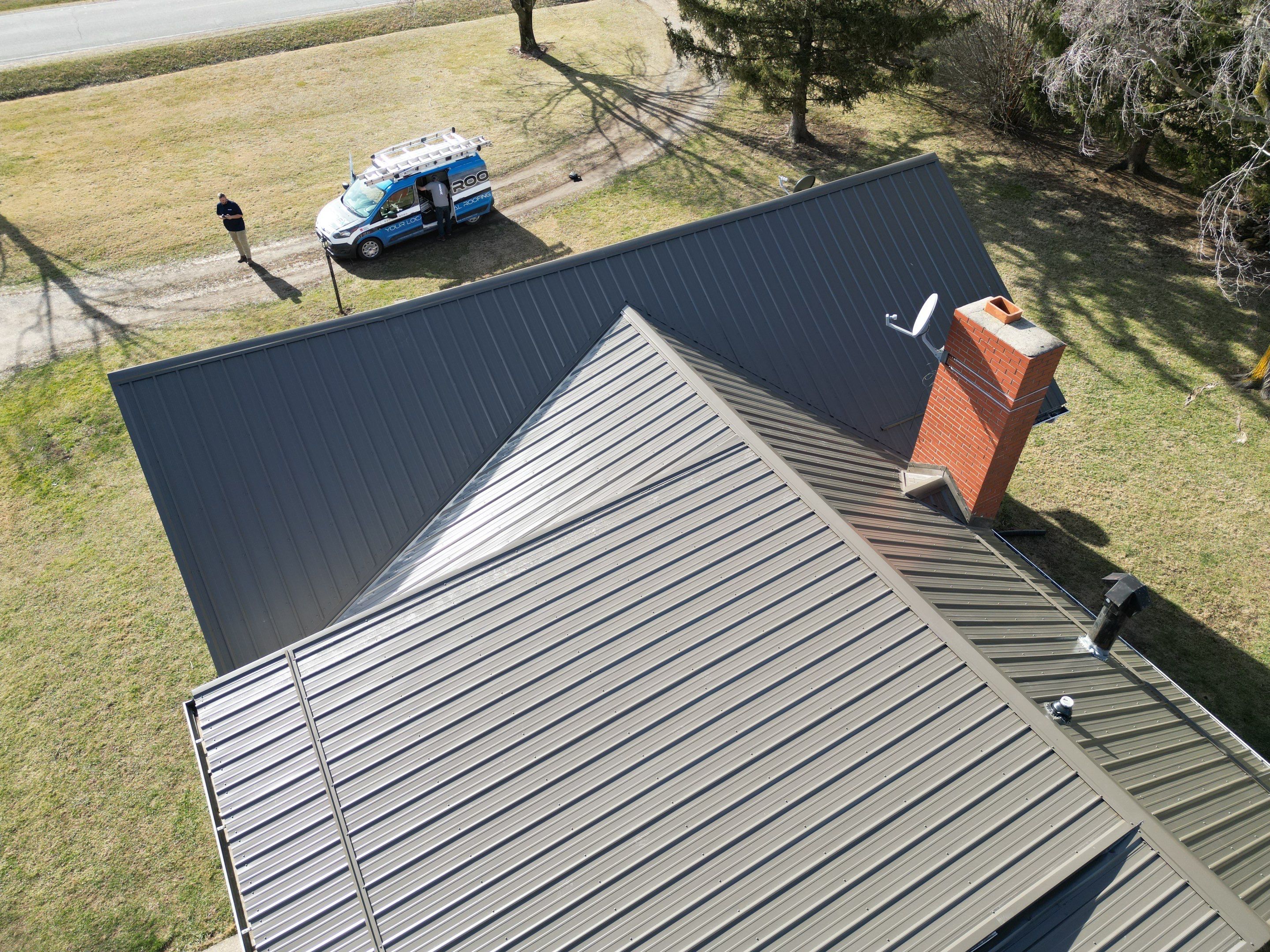 Residential Roofing Installation using Performance Panel Metal - Burnished Slate by RoofX 