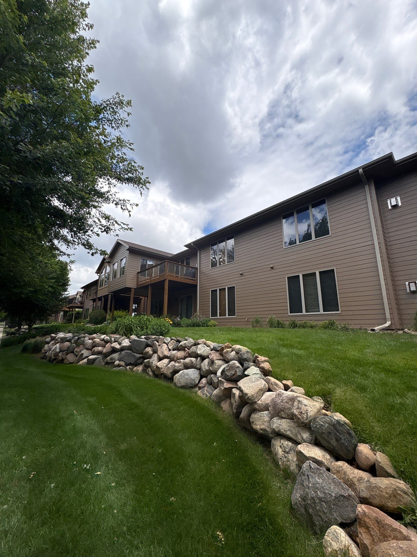 Multi-Story Residential Exterior Painting and Siding Refresh in Sioux Falls by Select Painting, Coatings & Garage Cabinets
