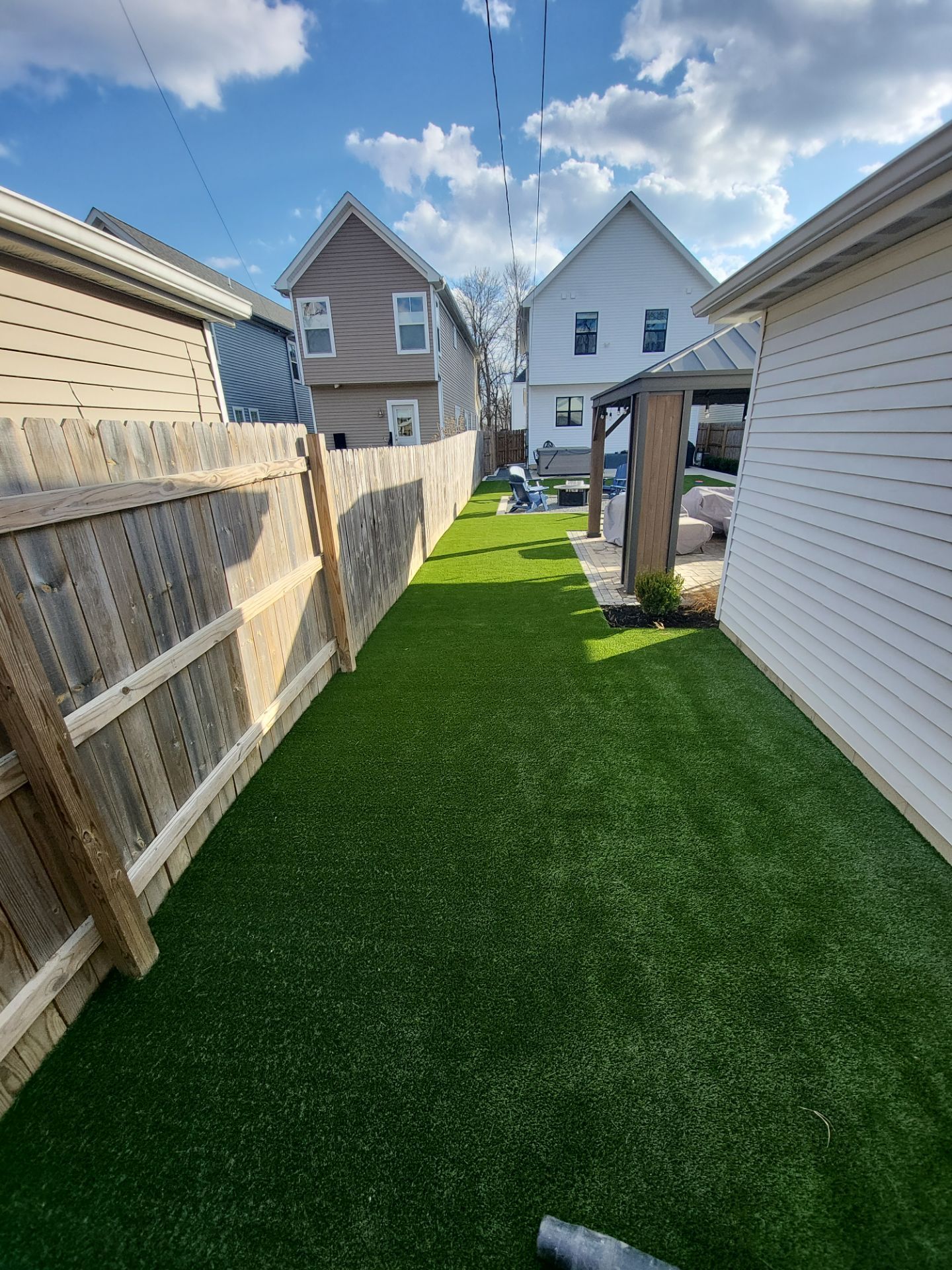 Full German Village Backyard  by Southwest Greens Midwest