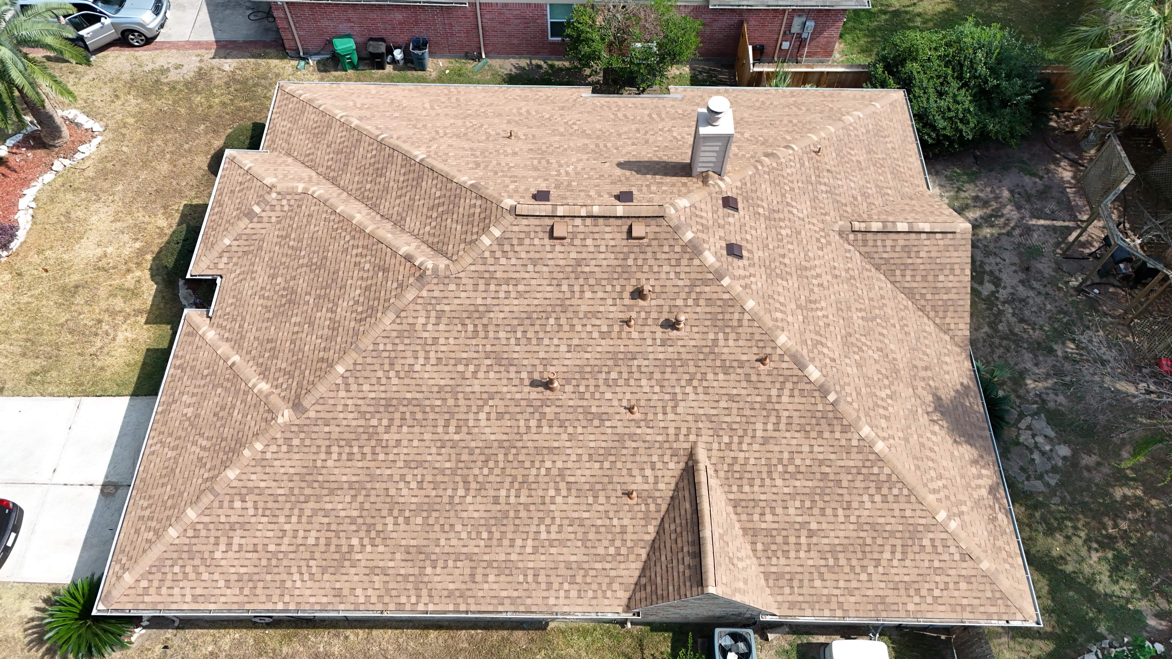Golden-Tan Roof Replacement — Spring, TX by PL Roofing & SB Roofing, LLC.