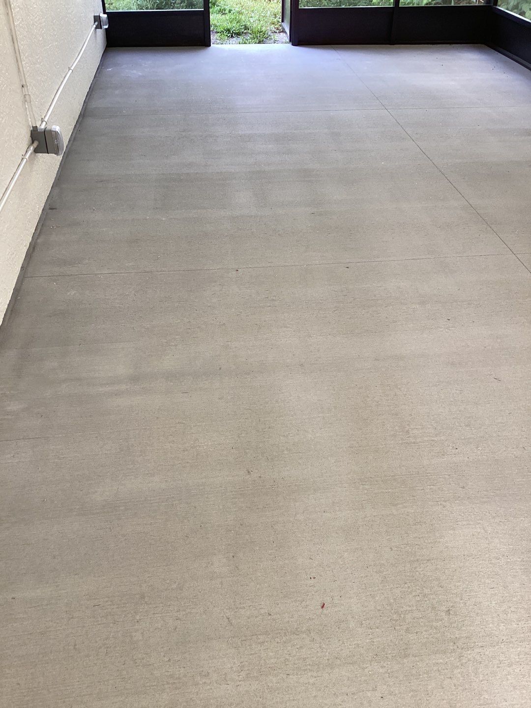 Patio using Pebble Beach by Amvet concrete coatings llc