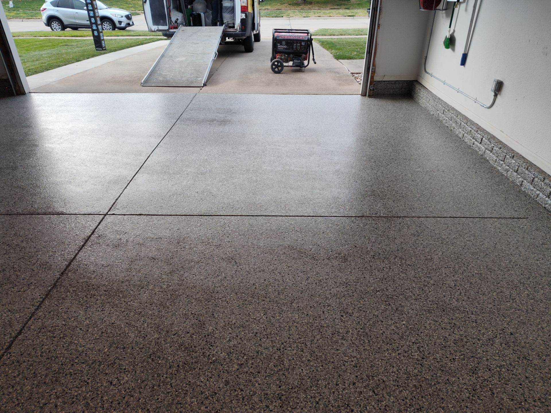 A Garage In One Day Keeps the Rock Salt Away! by Revival Concrete Coatings, LLC