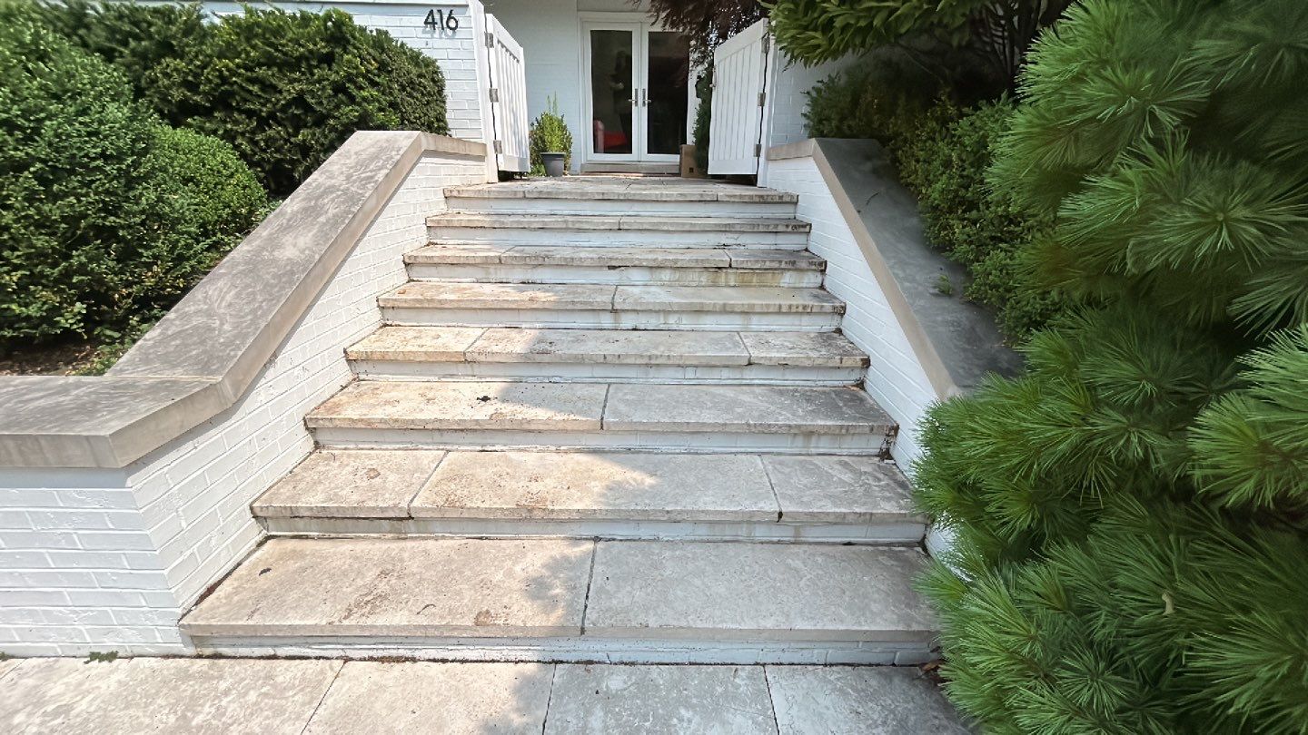 marble patio cleaning and sanding using Polysweep polymeric sand by Northern Power Washing LLC.