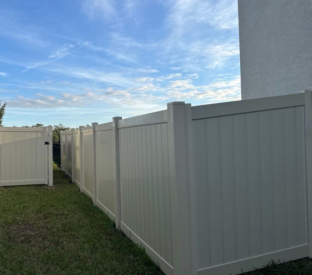 Vinyl Fence Installation using Vinyl Fence and a Black 3 Rail Aluminum Fence by Asap fence and gates, LLC