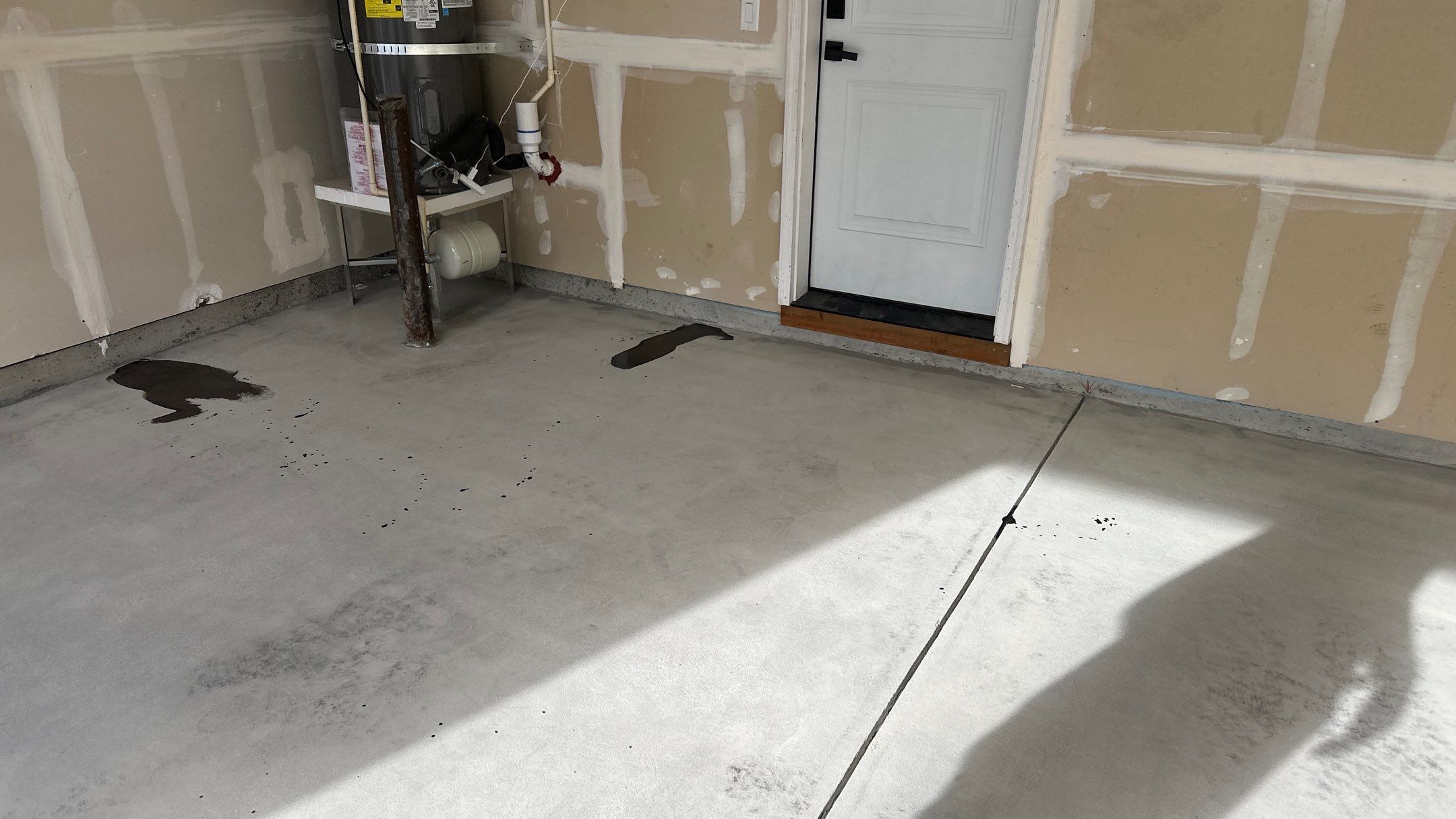 Garage Transformation using Smoke by Croc Coatings, LLC